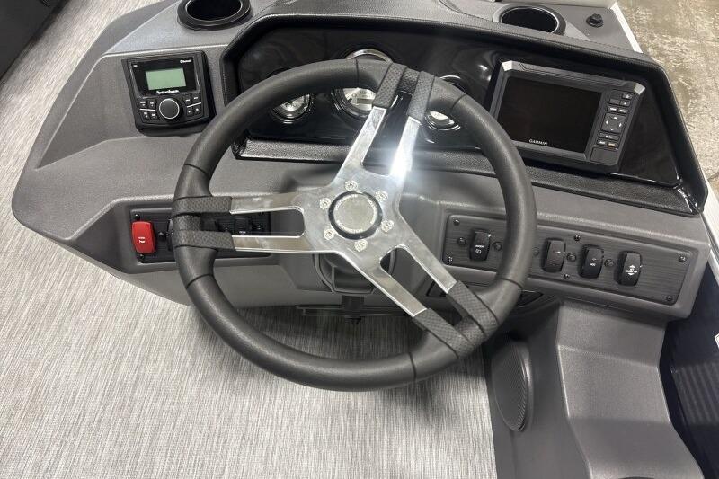 Steering console of 2026 Bennington 22 SSRSF boat with modern controls and displays.