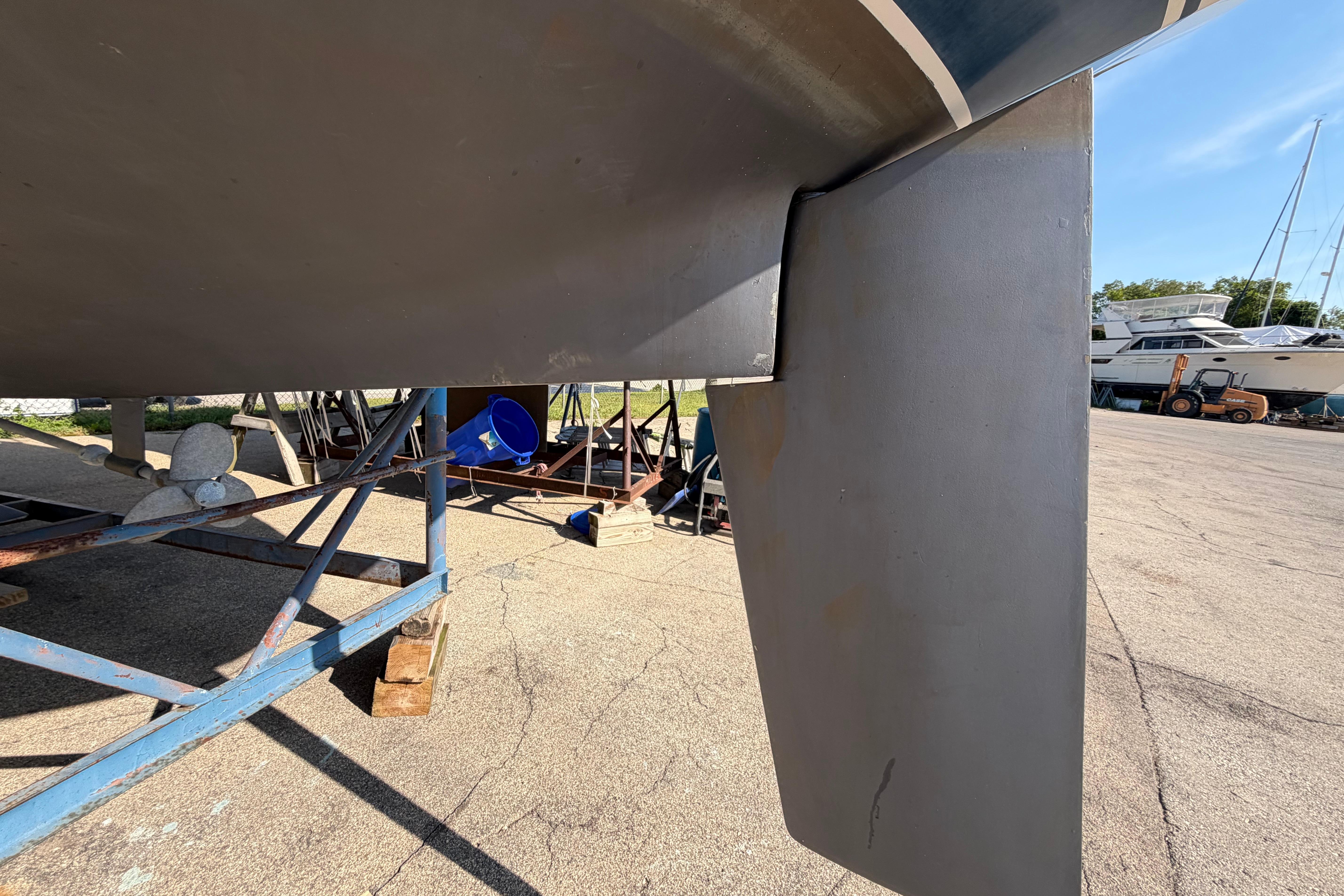 Catalina 30 MkII 1988 sailboat rudder and hull on dry dock.