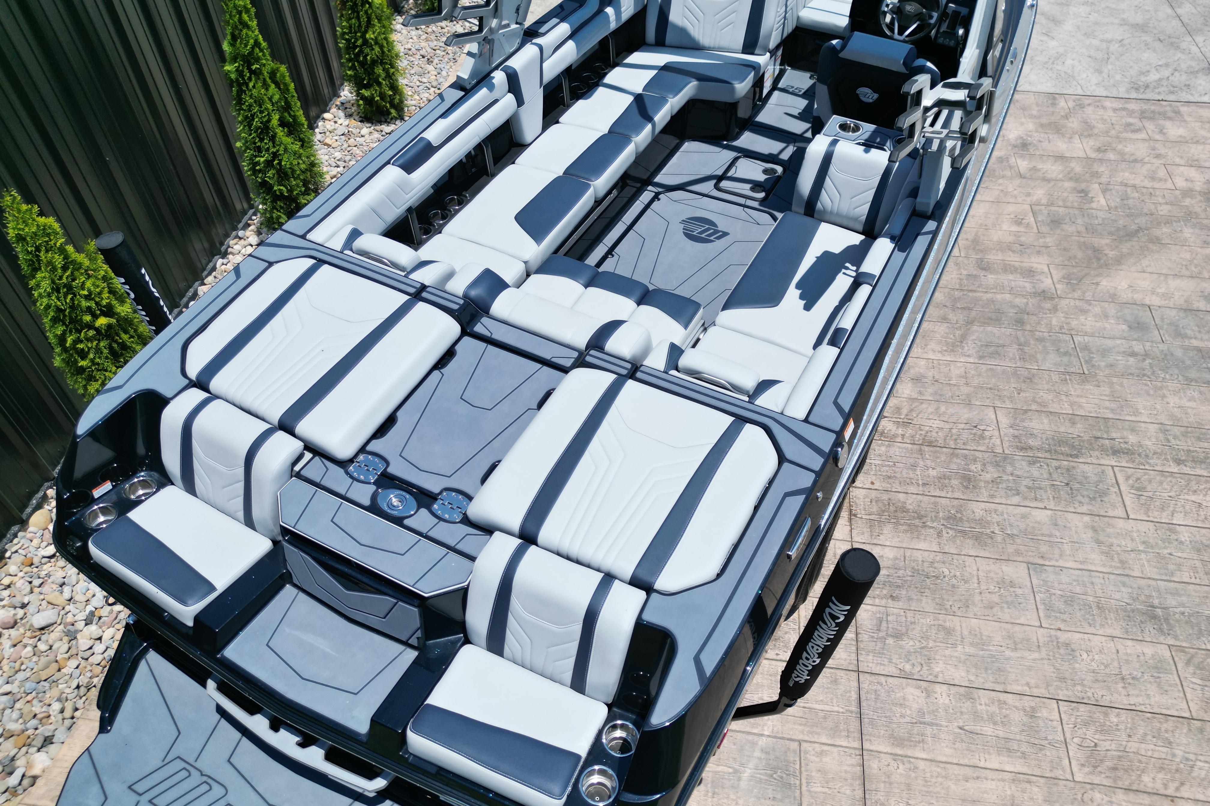 2025 Malibu Wakesetter 25 LSV boat interior with luxurious seating and modern design.