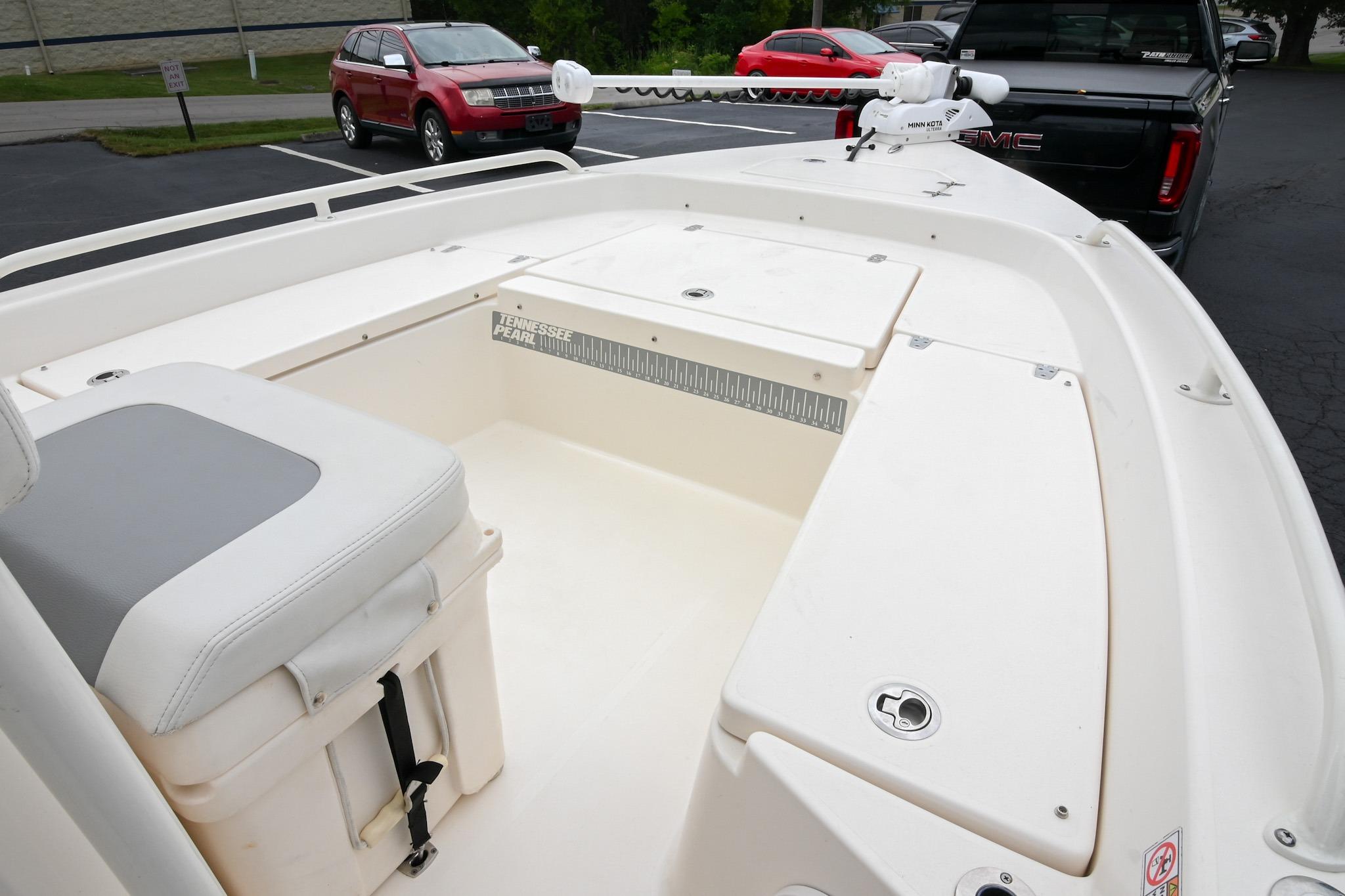 2021 Pathfinder 2200 TRS boat interior with seating and storage compartments.