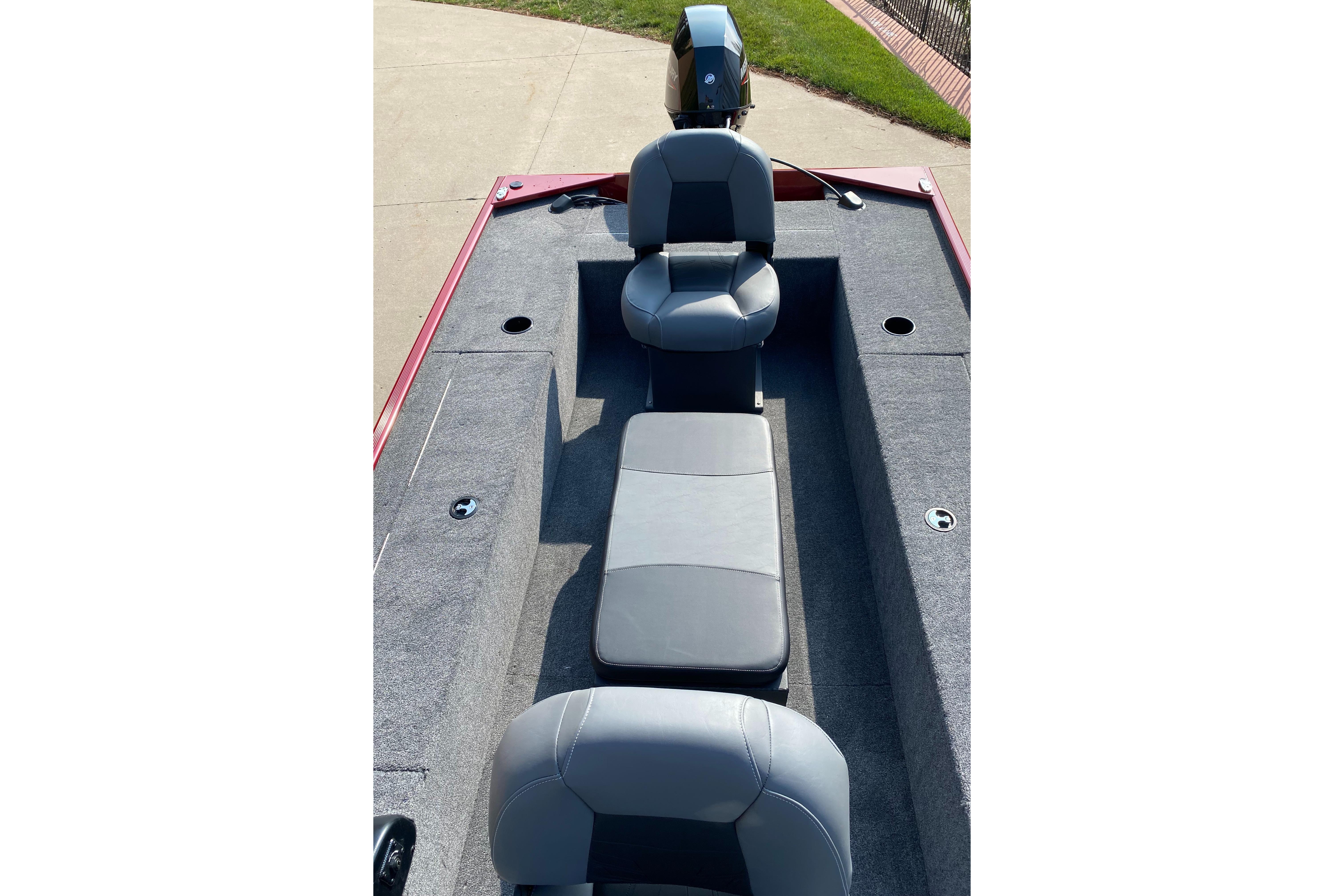 2025 Tracker Panfish 17 boat interior with gray seating and carpeted deck.