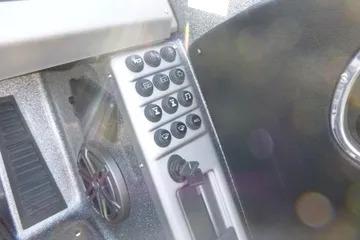 Control panel of 2026 Ranger 2080MS boat with buttons and speaker.