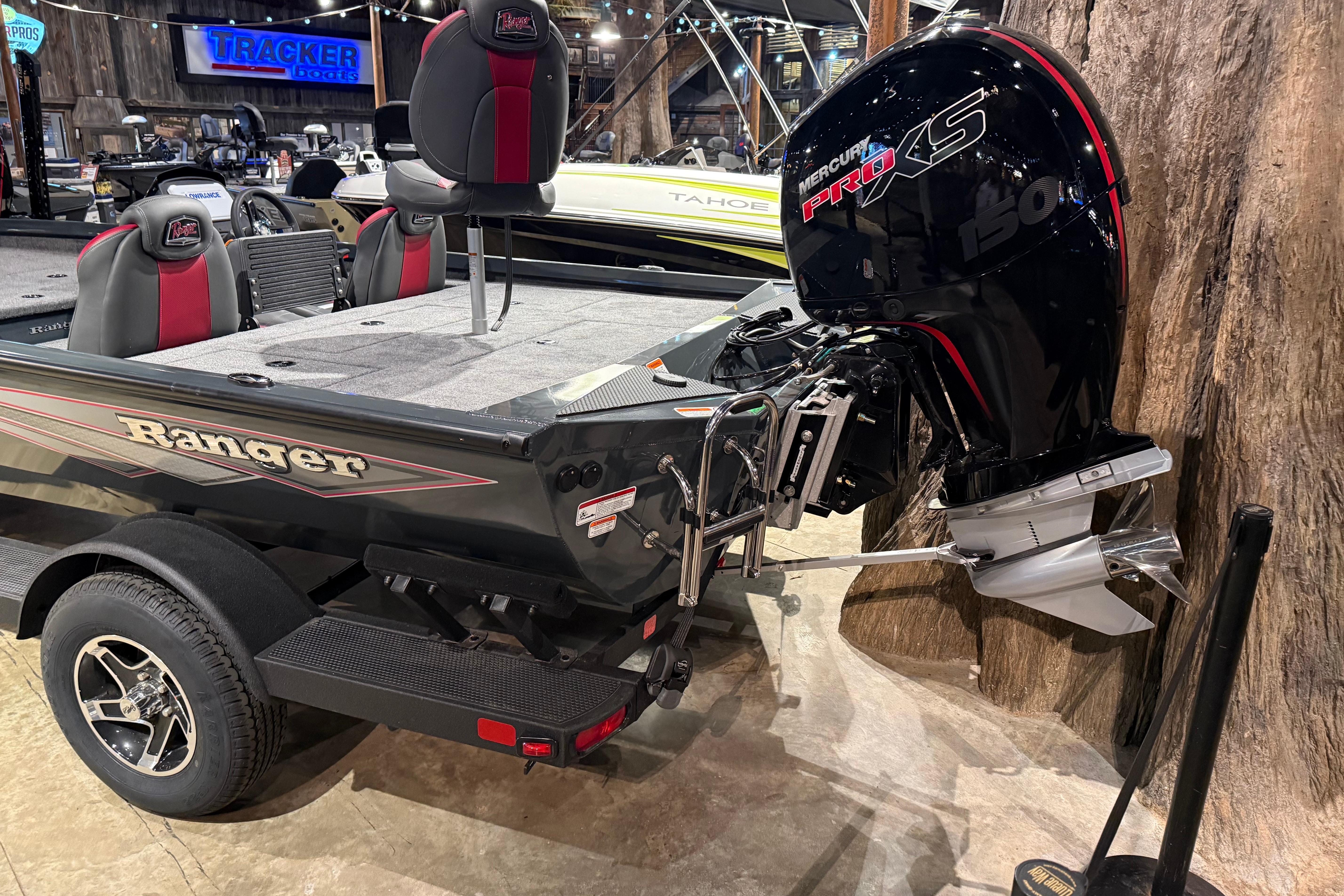 2026 Ranger RT198P boat with Mercury Pro XS engine on display indoors.