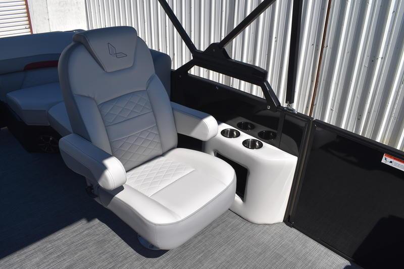 Luxurious seating in 2026 Lowe SS 210 WT boat with cup holders and modern design.