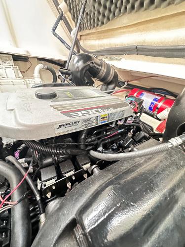 Engine compartment of a 2015 Sea Ray 260 Sundancer boat, featuring a Mercury 350 engine.