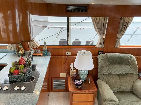 Interior of 2000 Novatec Islander 55 yacht with cozy seating and elegant decor.