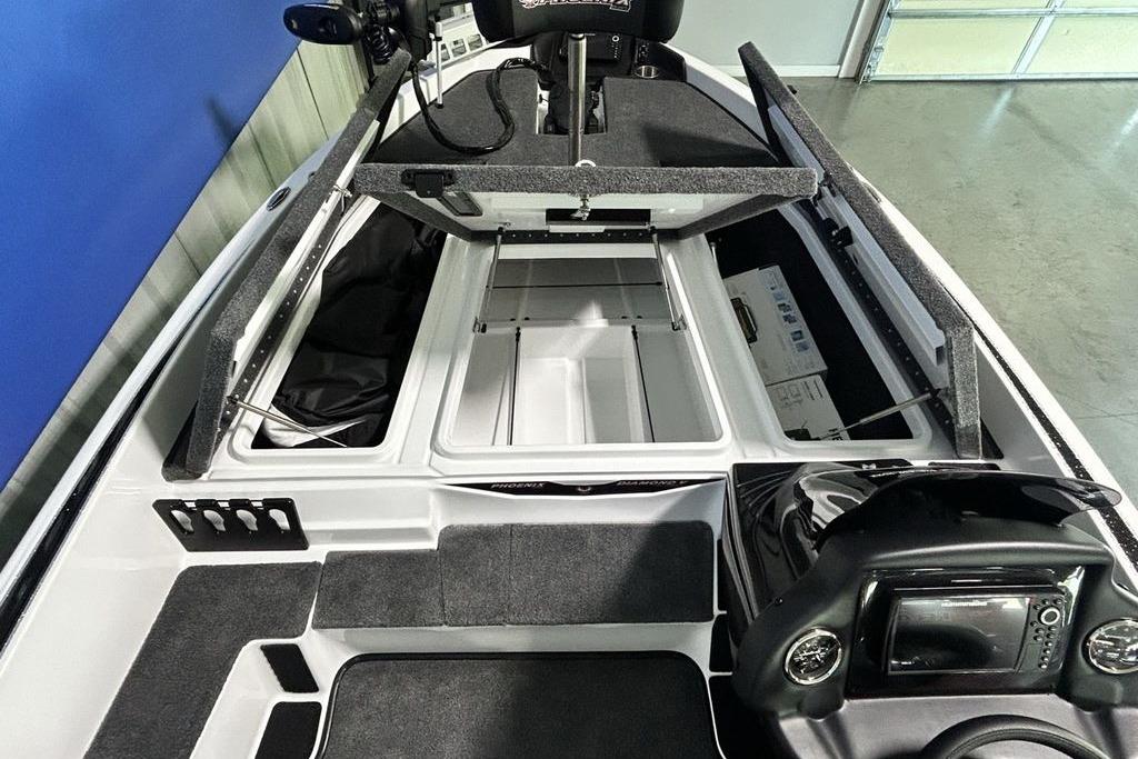 Interior view of 2026 Phoenix 818 Pro boat with open storage compartments.