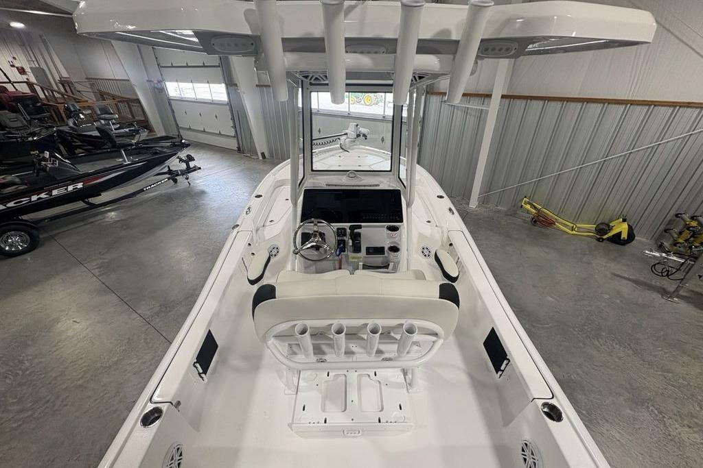 2026 Tidewater 2210 Carolina Bay boat in a spacious indoor storage facility.