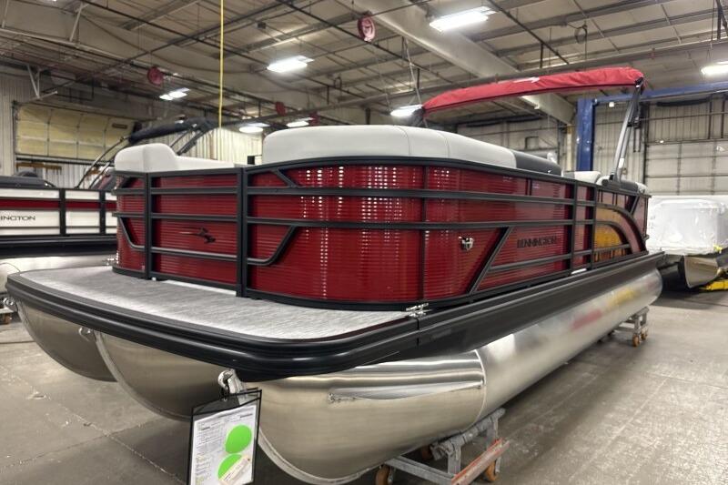 2026 Bennington 22 SSRSF pontoon boat in a warehouse setting.
