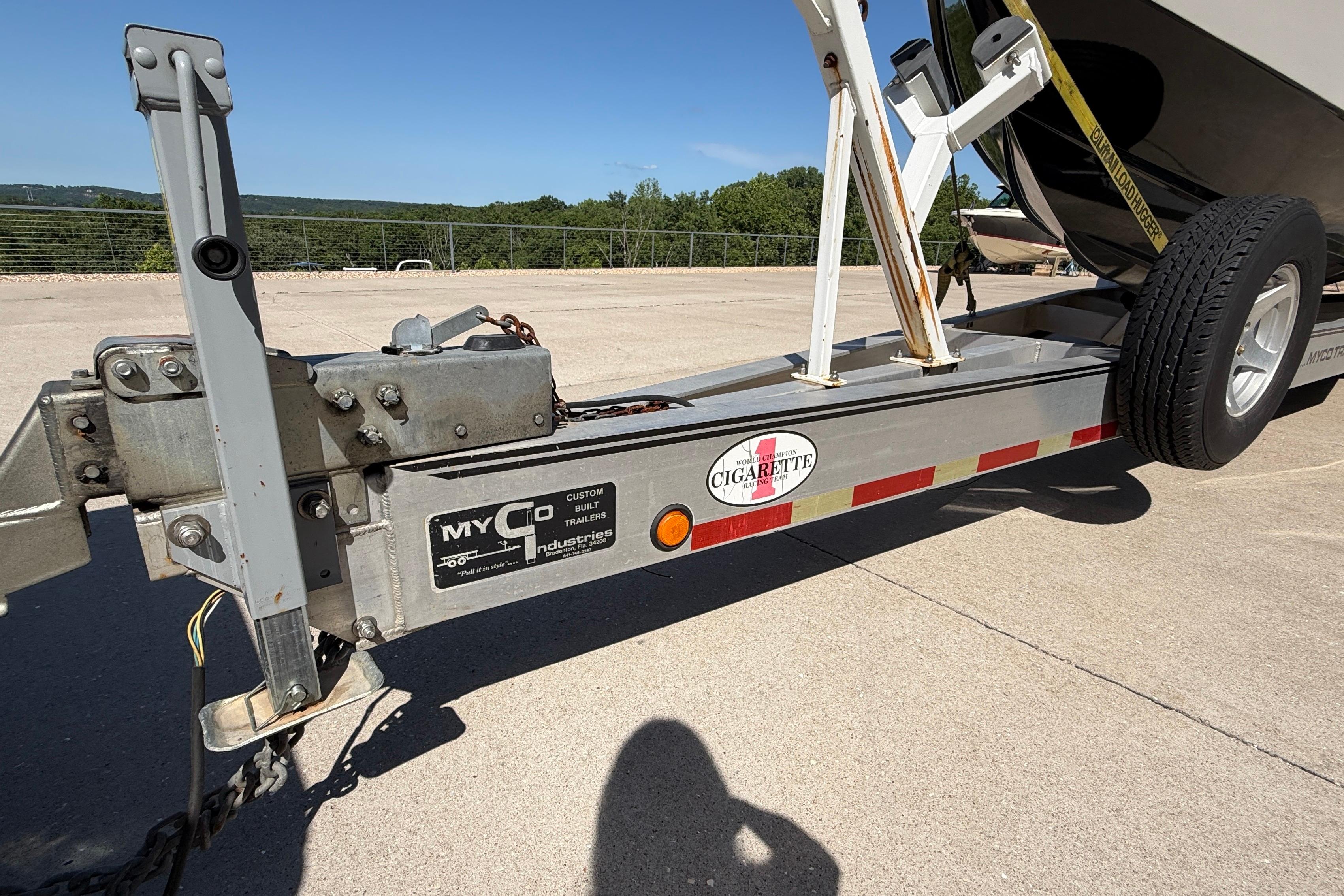 Trailer for 2002 Cigarette 35' Cafe Racer boat, featuring Myco Industries branding.