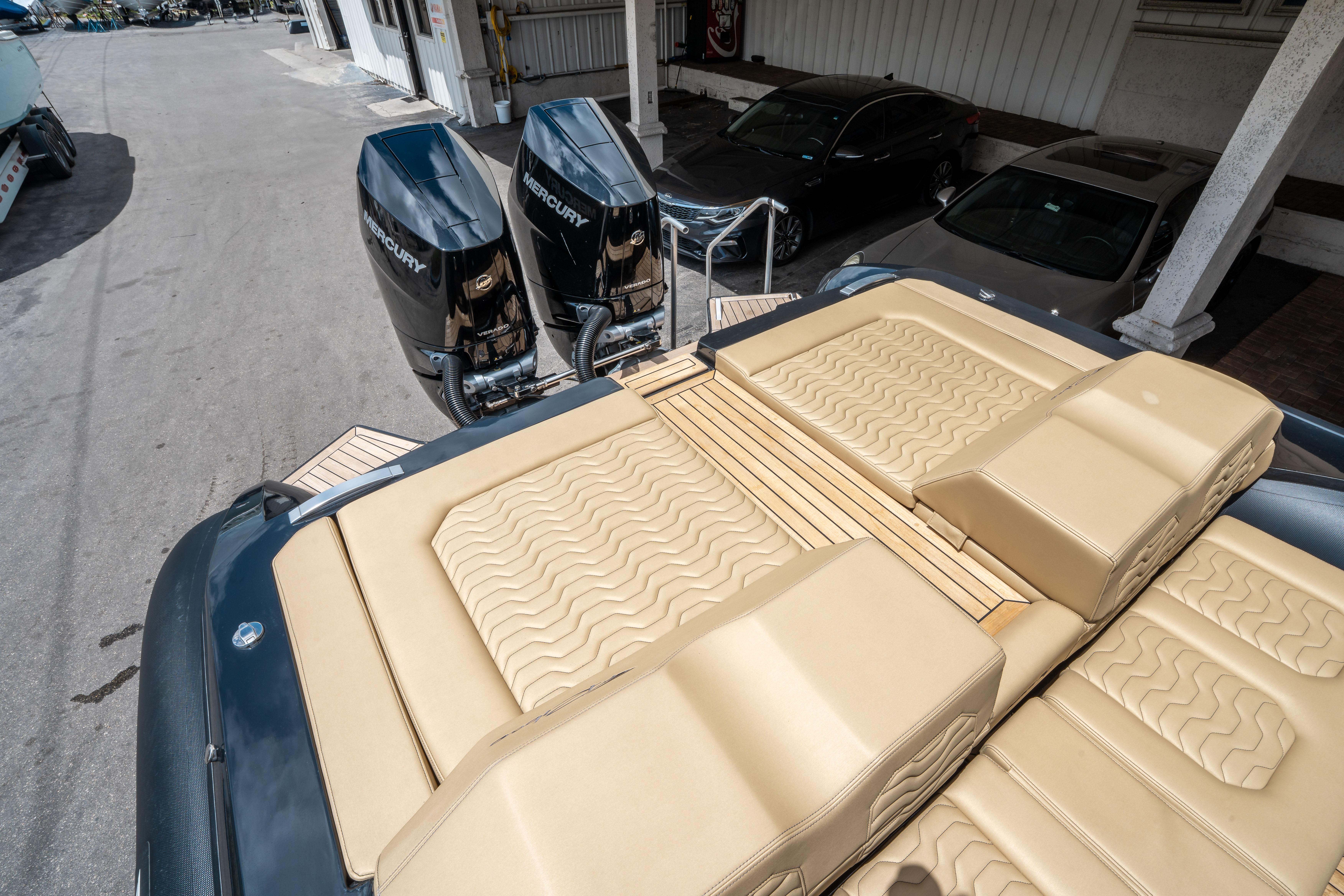 2023 Ribco Seafarer 36 X with dual Mercury outboard engines and luxurious tan seating.