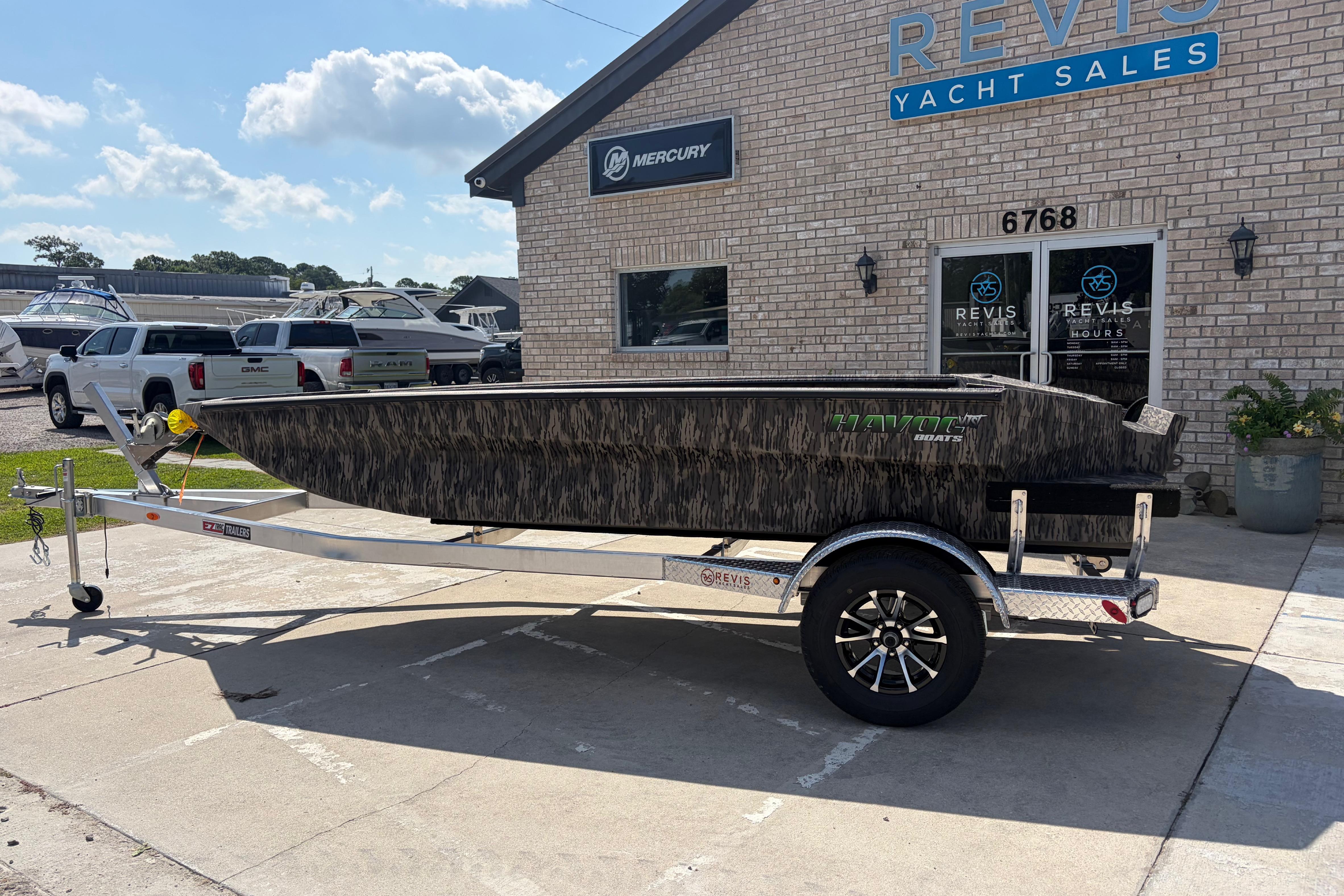2026 Havoc 1653 VJST boat on trailer at Revis Yacht Sales dealership.