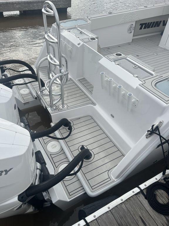 2024 Twin Vee 400 GFX boat with dual engines and sleek deck design.