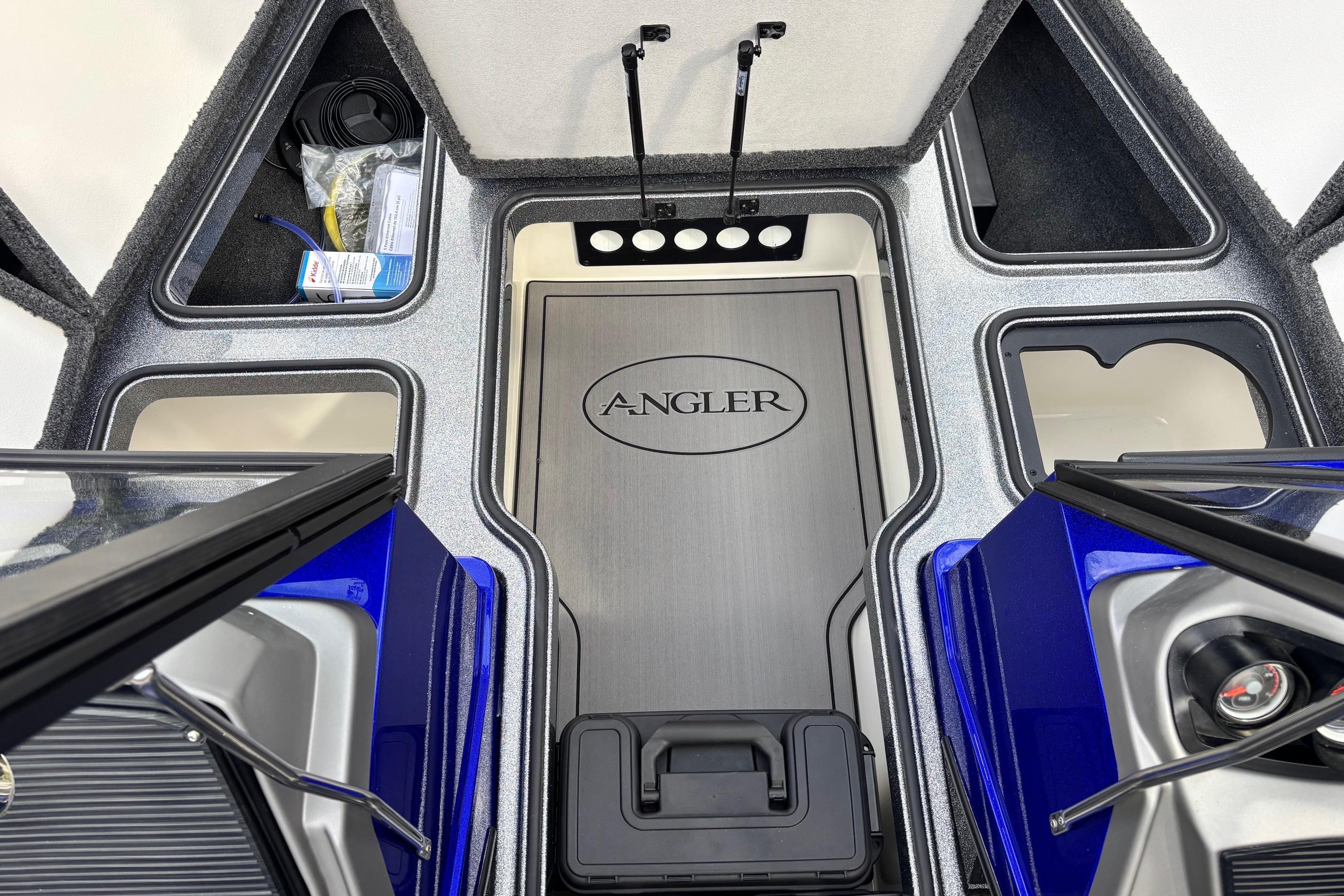 Interior view of 2026 Ranger 1880MS A Pack Equipped boat with storage compartments.