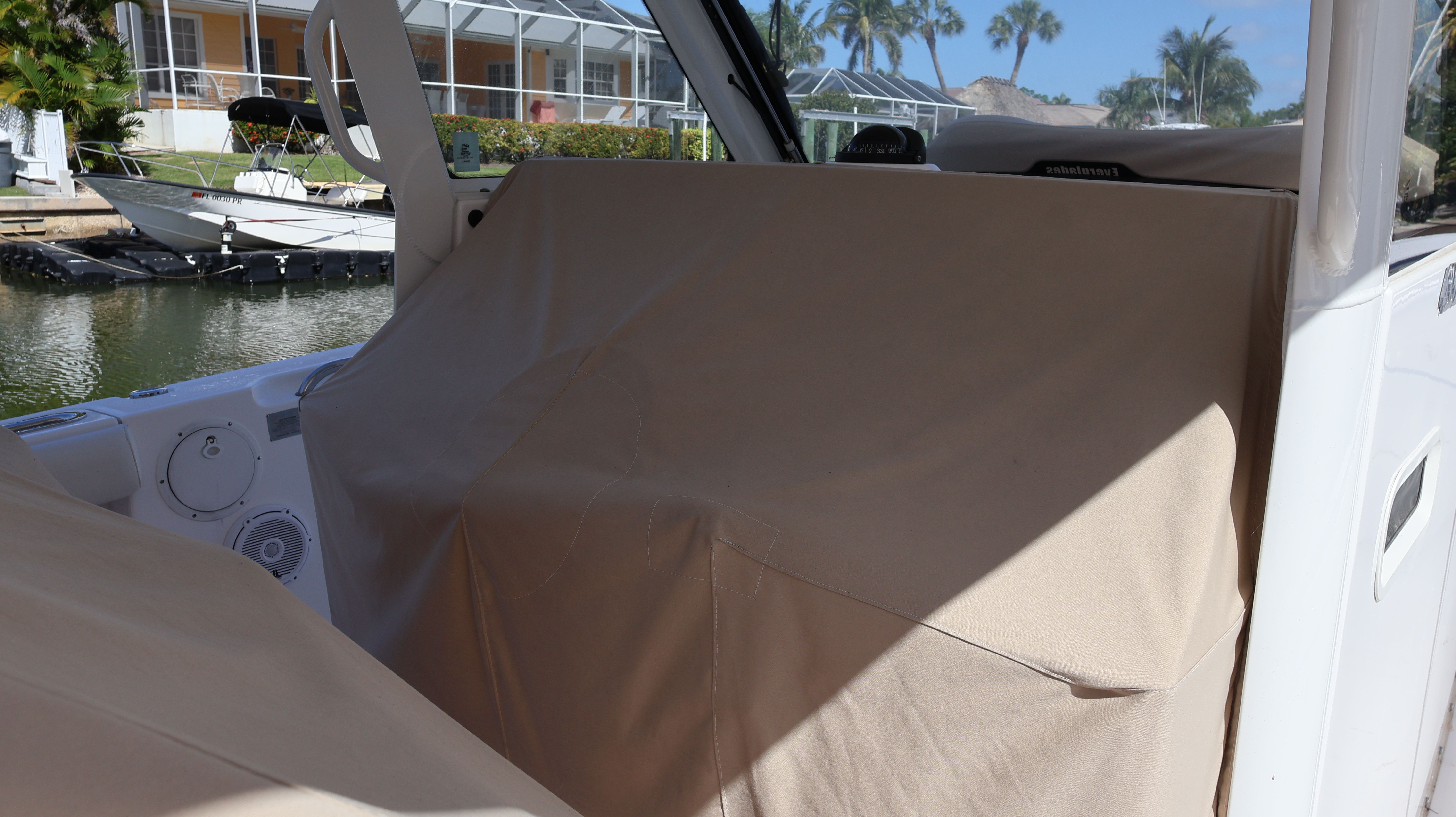 Covered cockpit of a 2019 Everglades 435 Center Console boat.