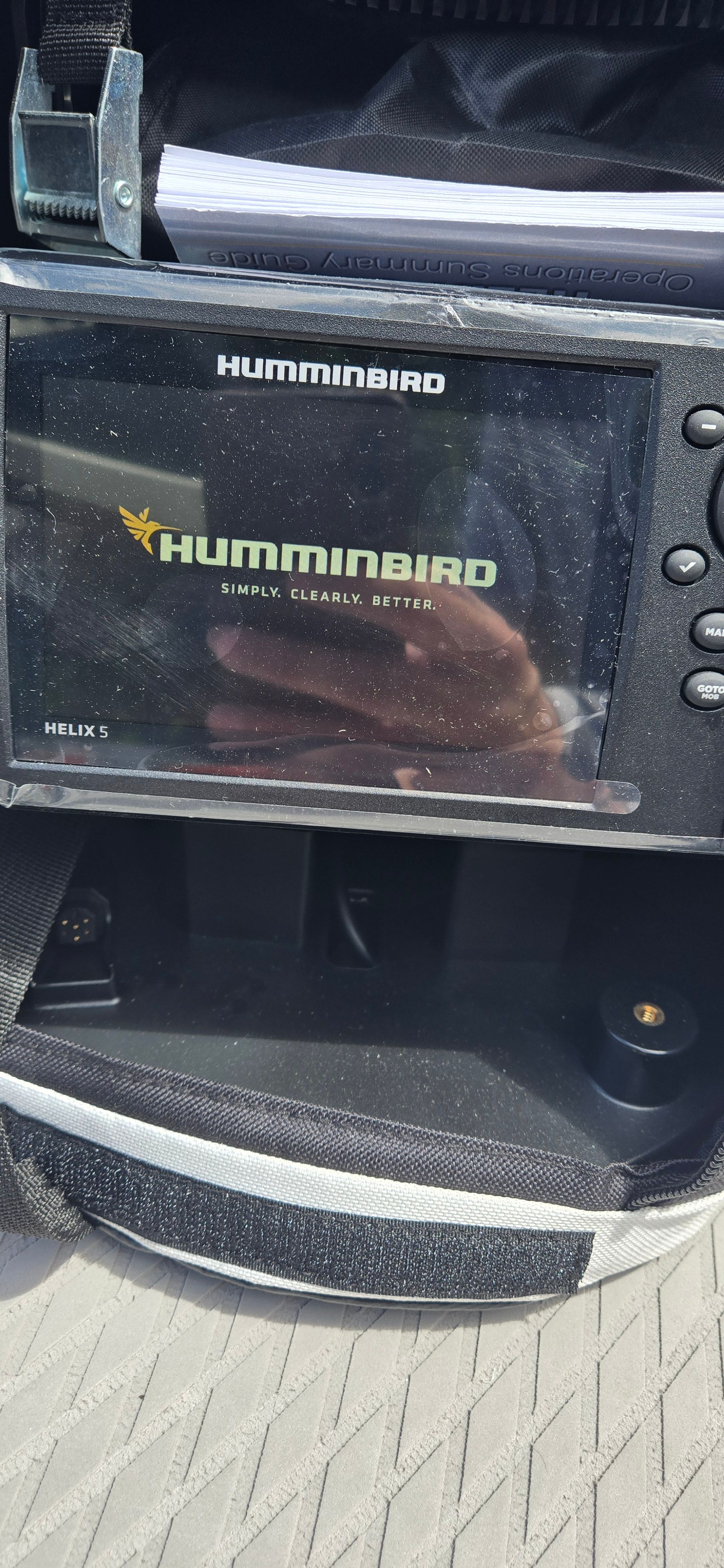 A Humminbird Helix 5 fish finder on a boat.