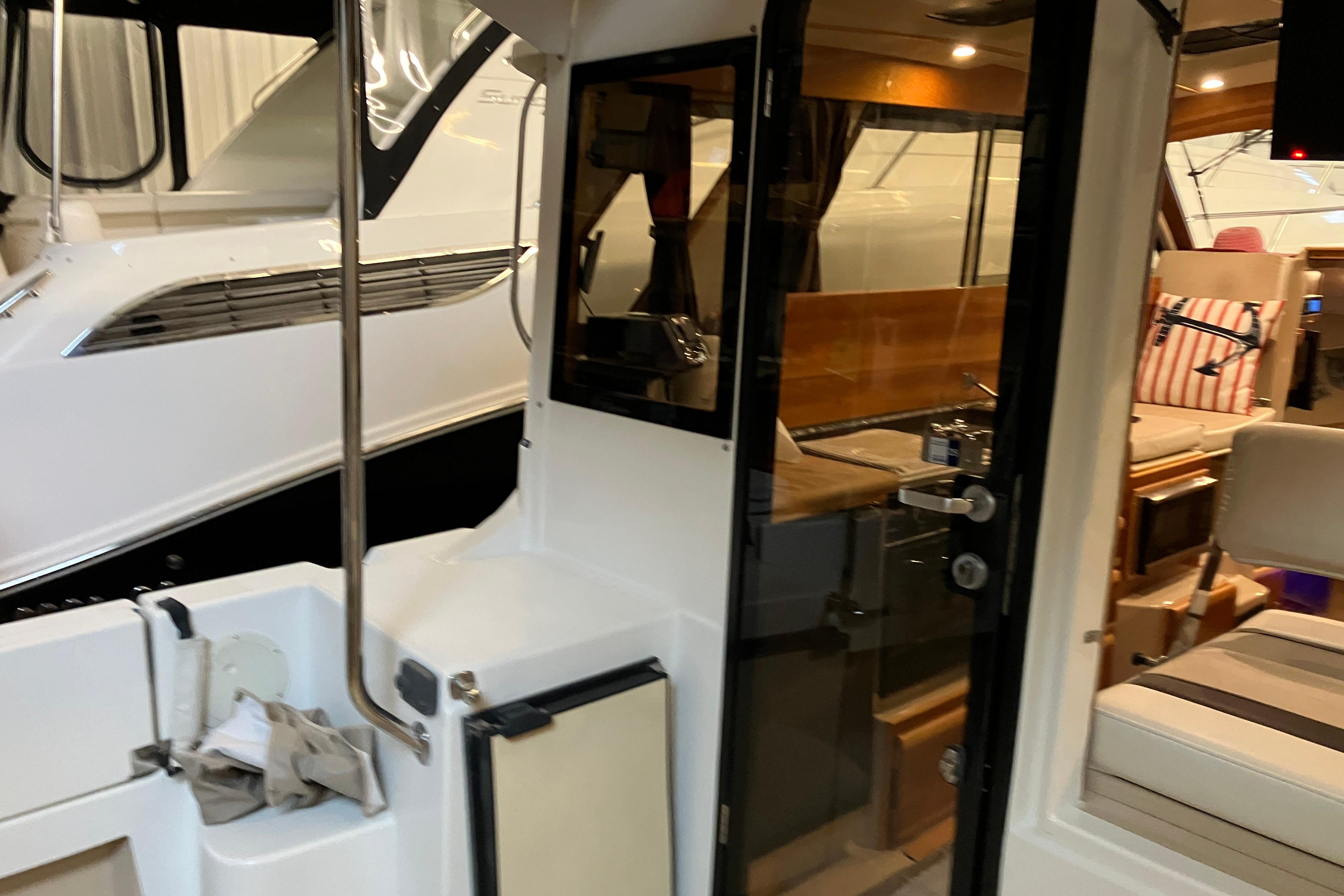 2017 Cutwater C-30 Sedan interior view with seating and kitchen area.