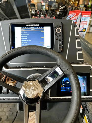 Steering wheel and dashboard of 2025 Ranger ALPHA 208 boat with digital displays.