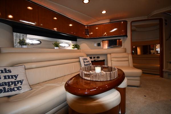 Luxurious interior of 2003 Sea Ray 460 Sundancer yacht with elegant seating and decor.