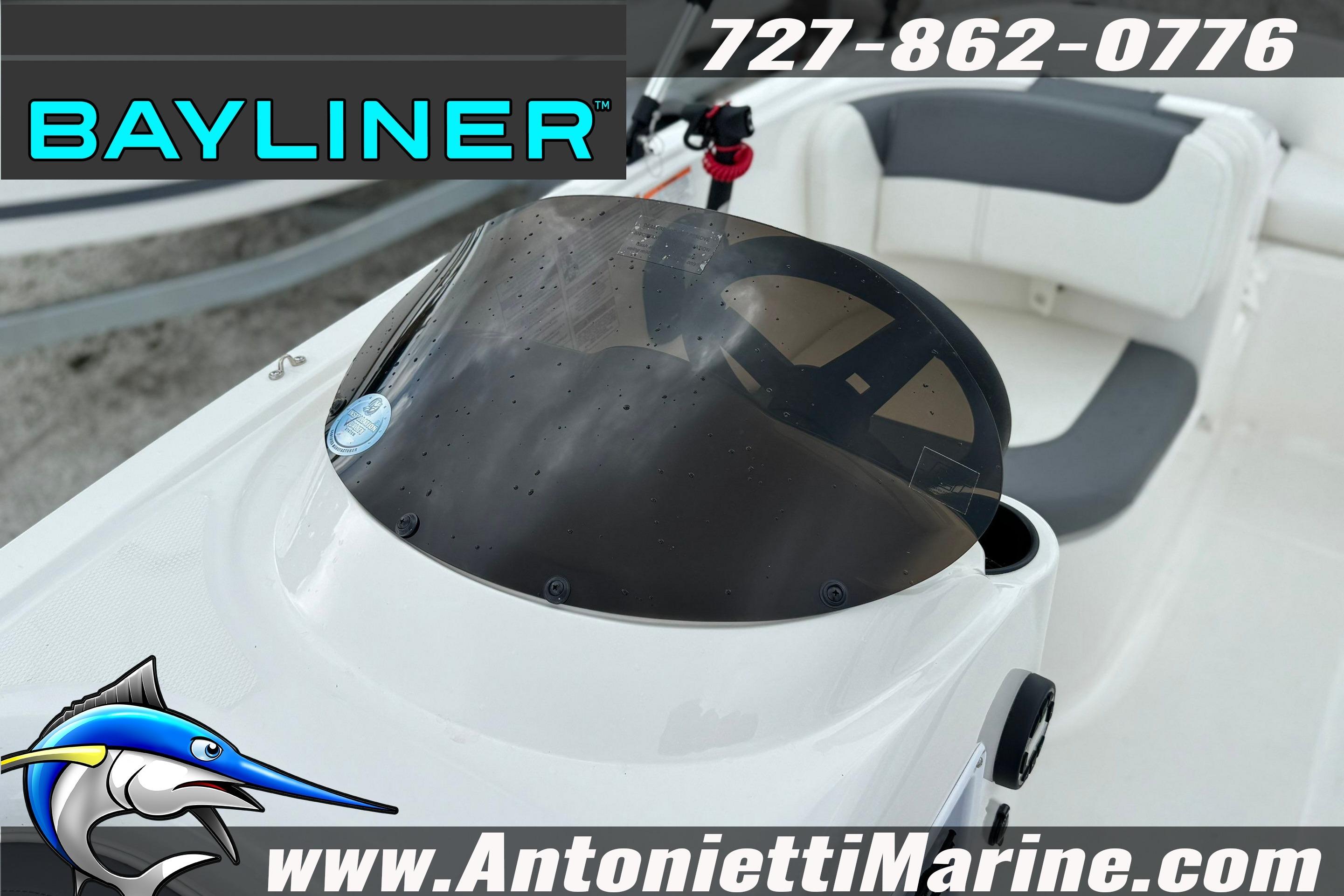 2026 Bayliner Element E16 boat interior with windshield, contact info, and logo.