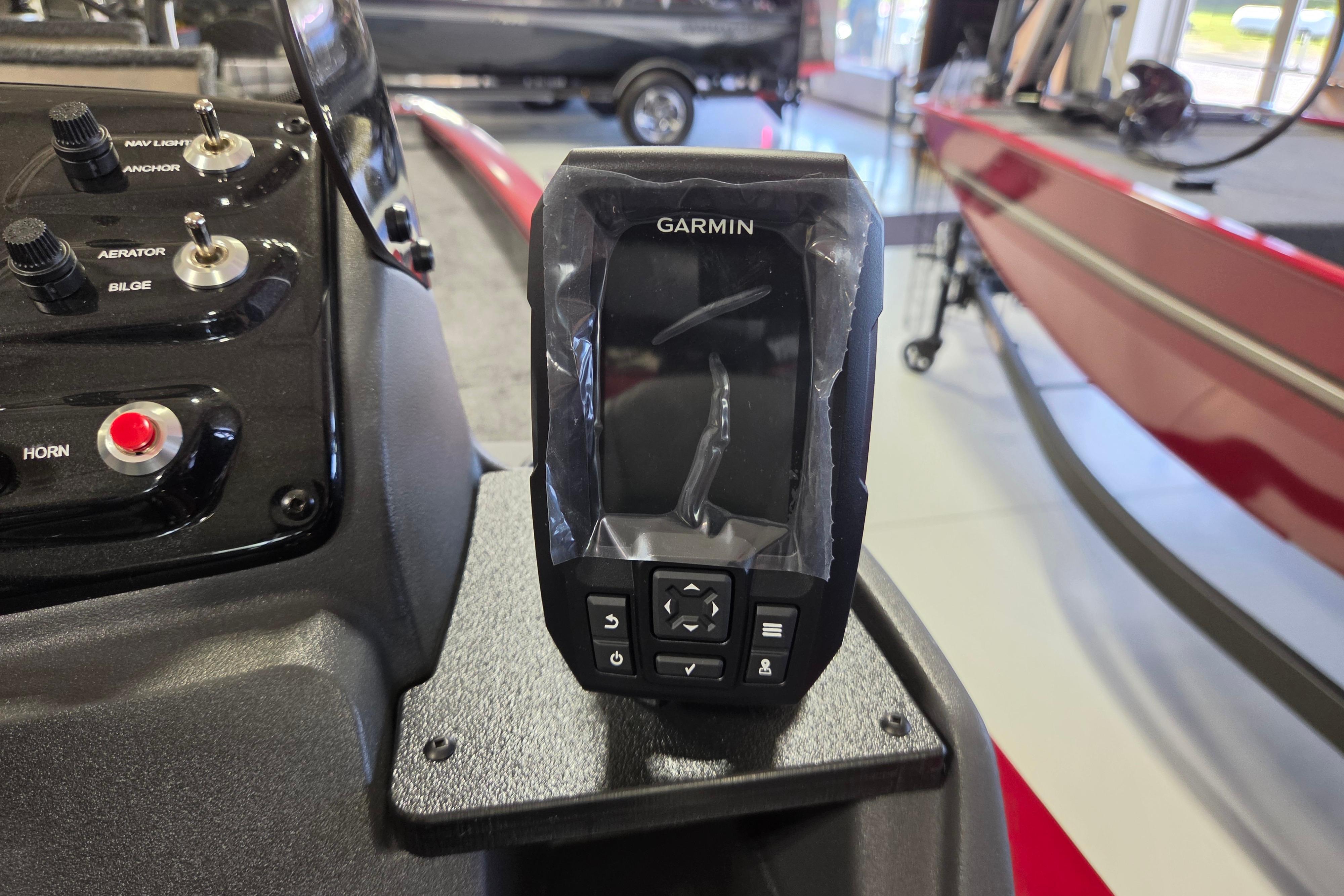 Garmin device on 2026 Tracker Pro 170 boat dashboard with control switches.