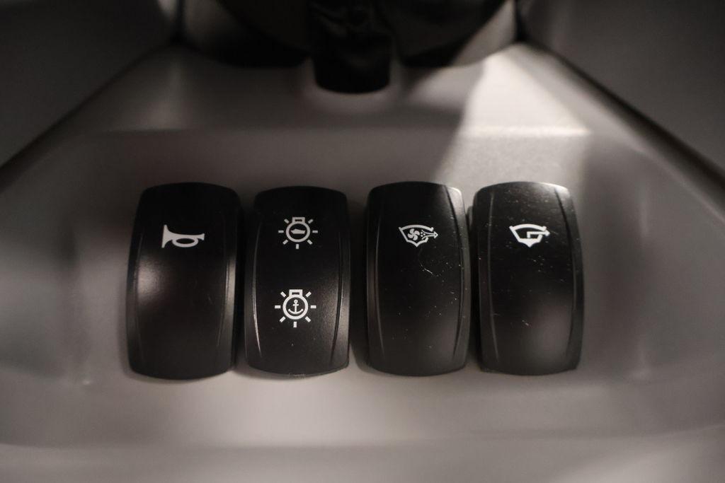 Dashboard switches of 2023 Sea-Doo Switch Sport Compact watercraft.