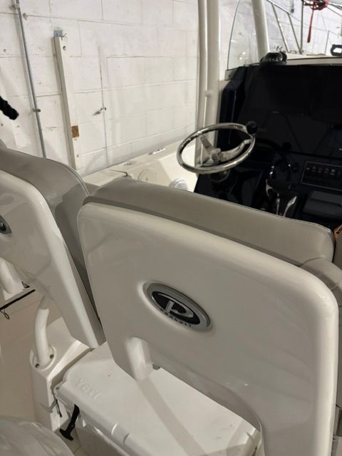 Interior view of a 2022 Pursuit C 238 Center Console boat.