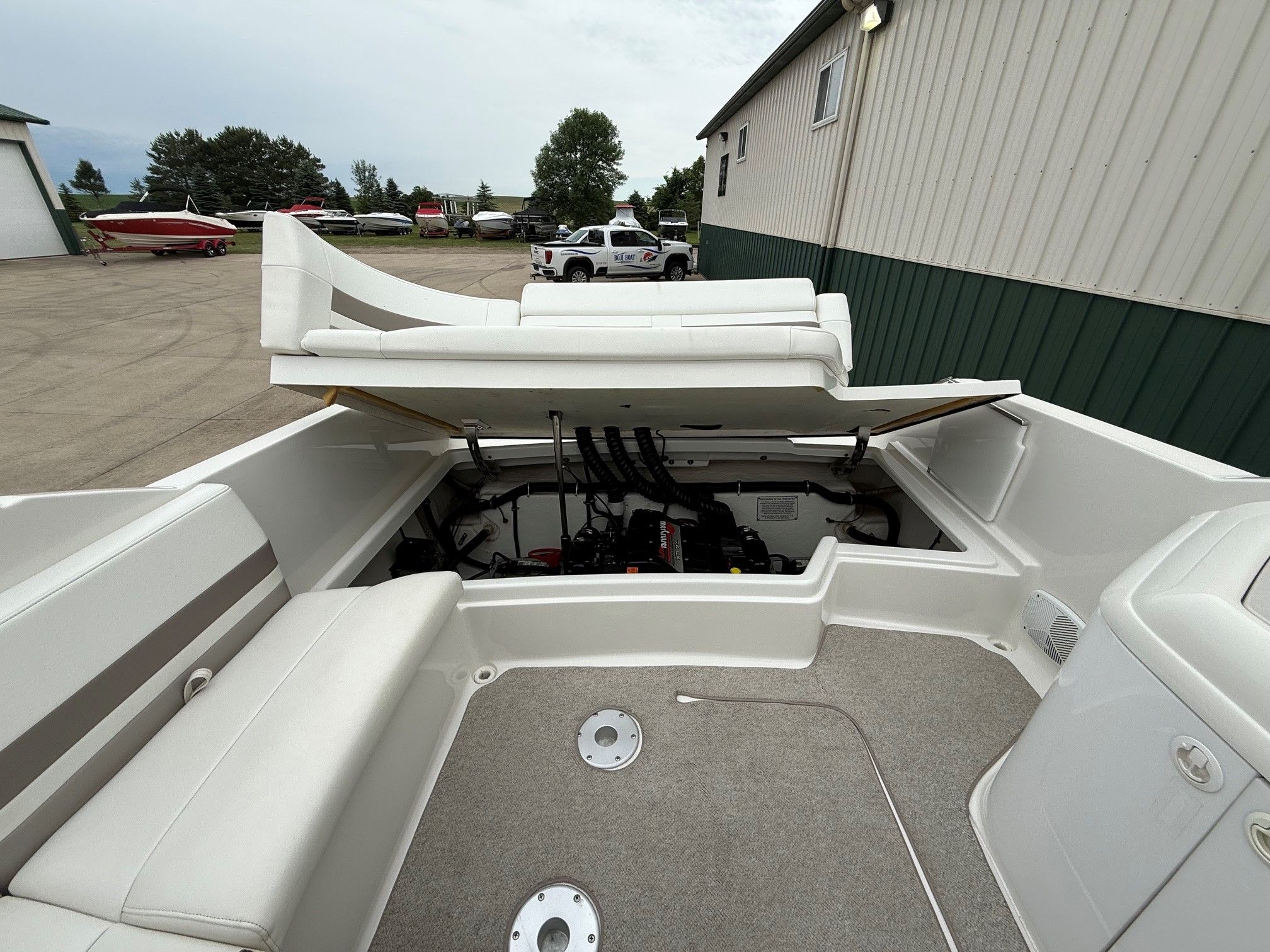 1998 Formula Thunderbird boat with open engine compartment.