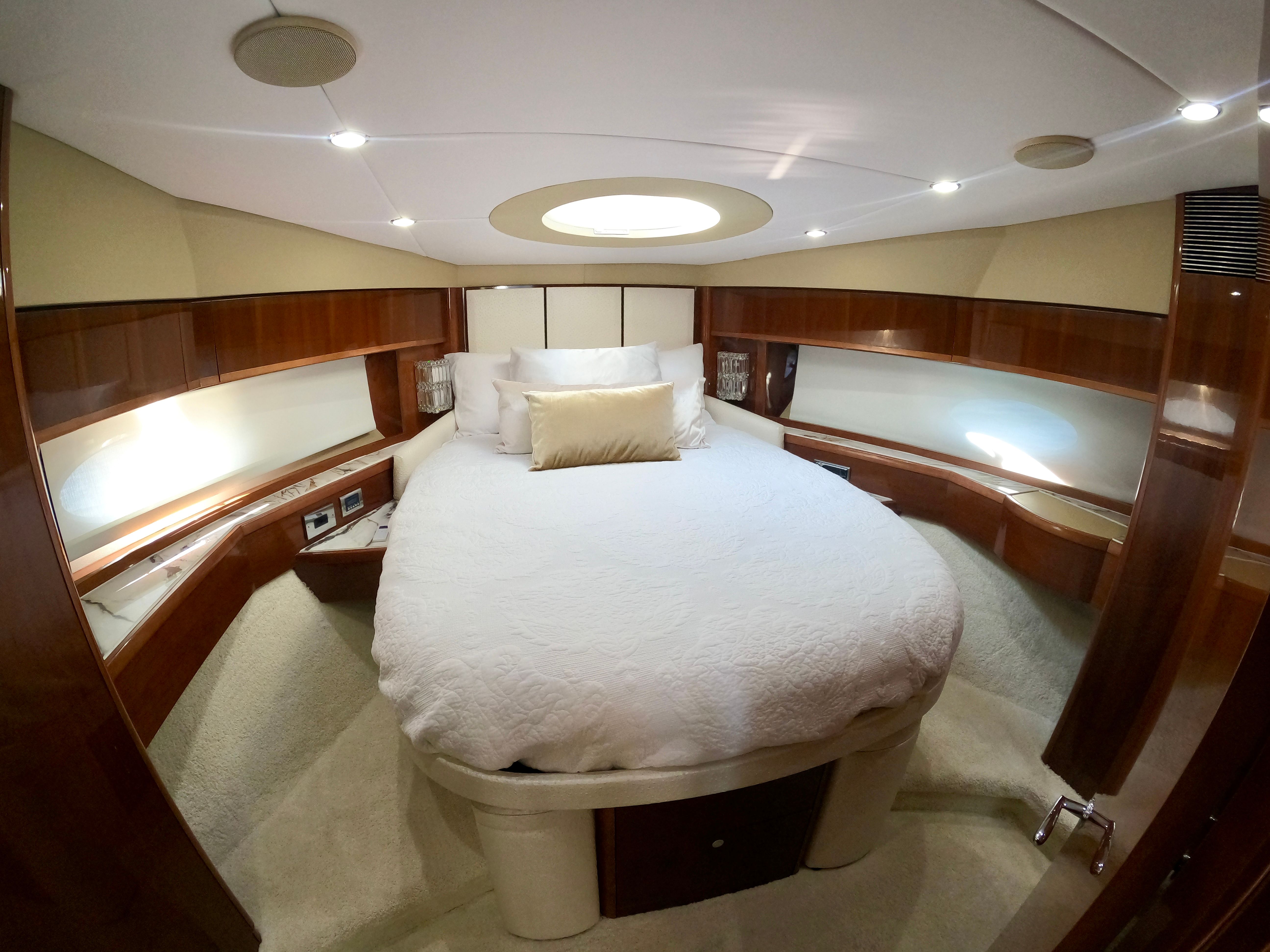 Luxurious bedroom on Viking Princess F54 flybridge yacht, year 2009.