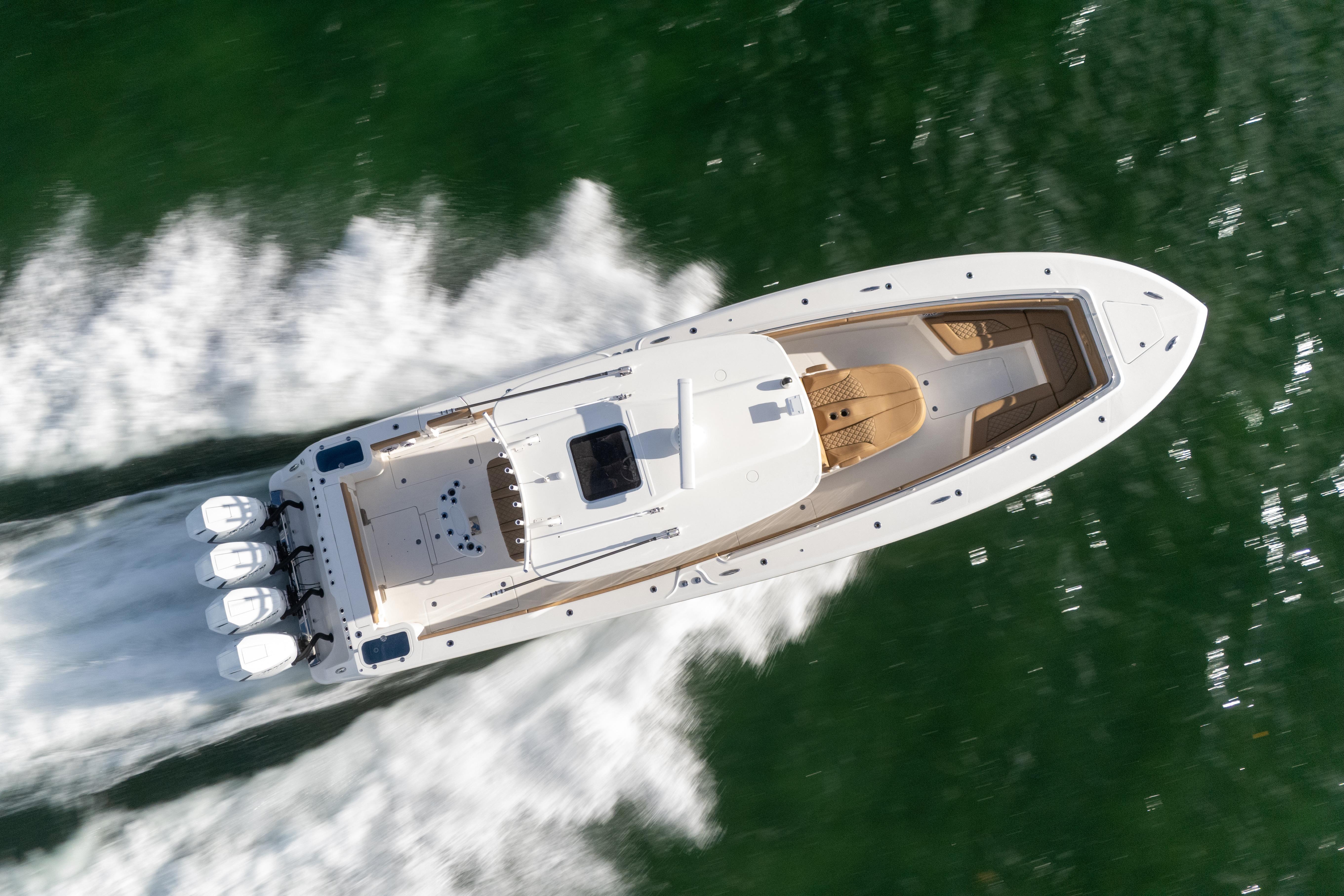 Aerial view of 2026 Blackwater 41 Performance Fish boat speeding on water.