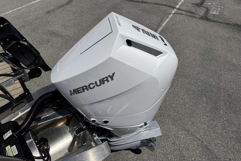 Mercury outboard motor on 2026 Avalon Excalibur LTD Quad Lounge boat.