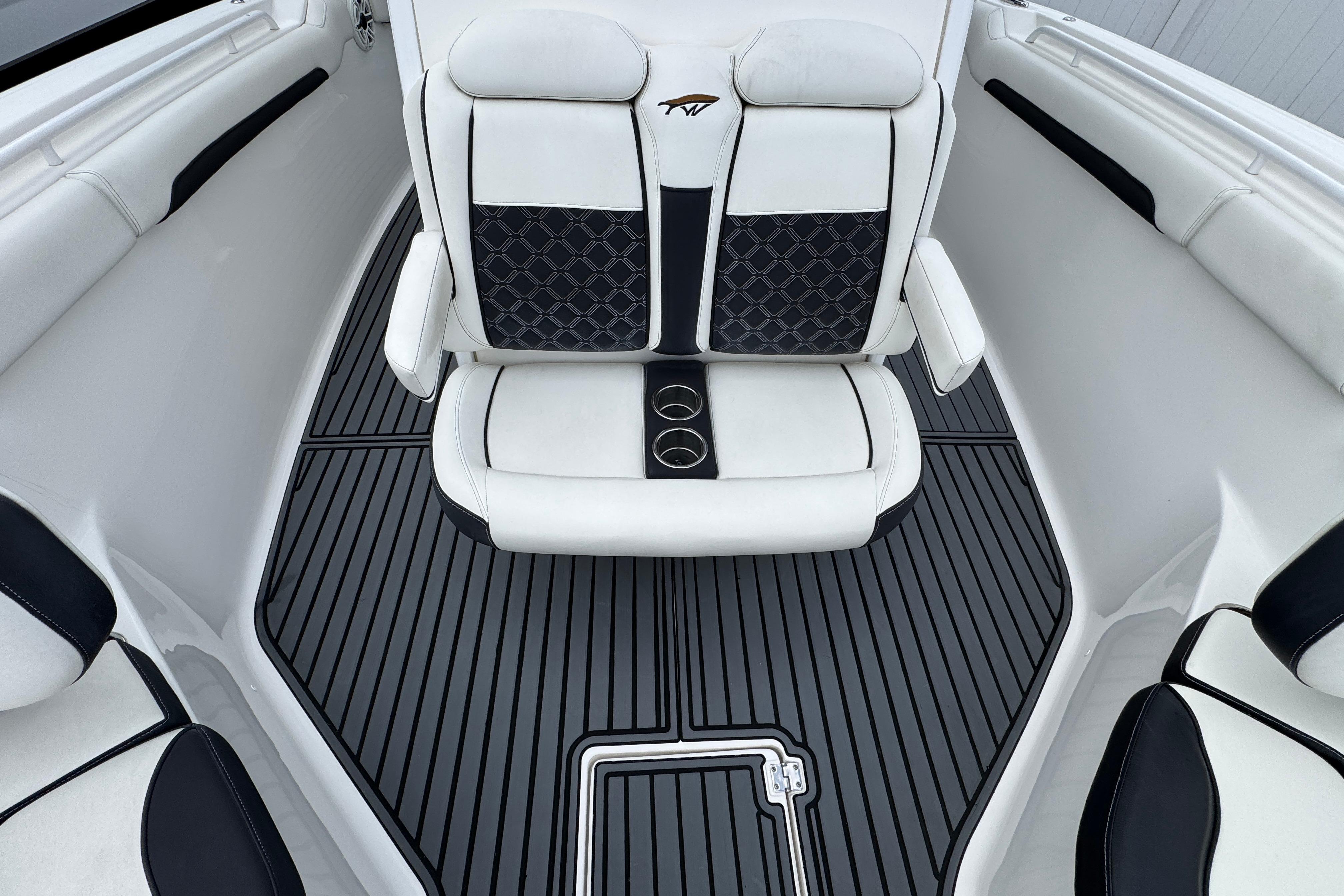 2021 Tidewater 280 CC Adventure boat interior with stylish seating and cup holders.