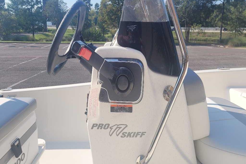 2026 Mako Pro Skiff 17 CC steering console with wheel and controls.