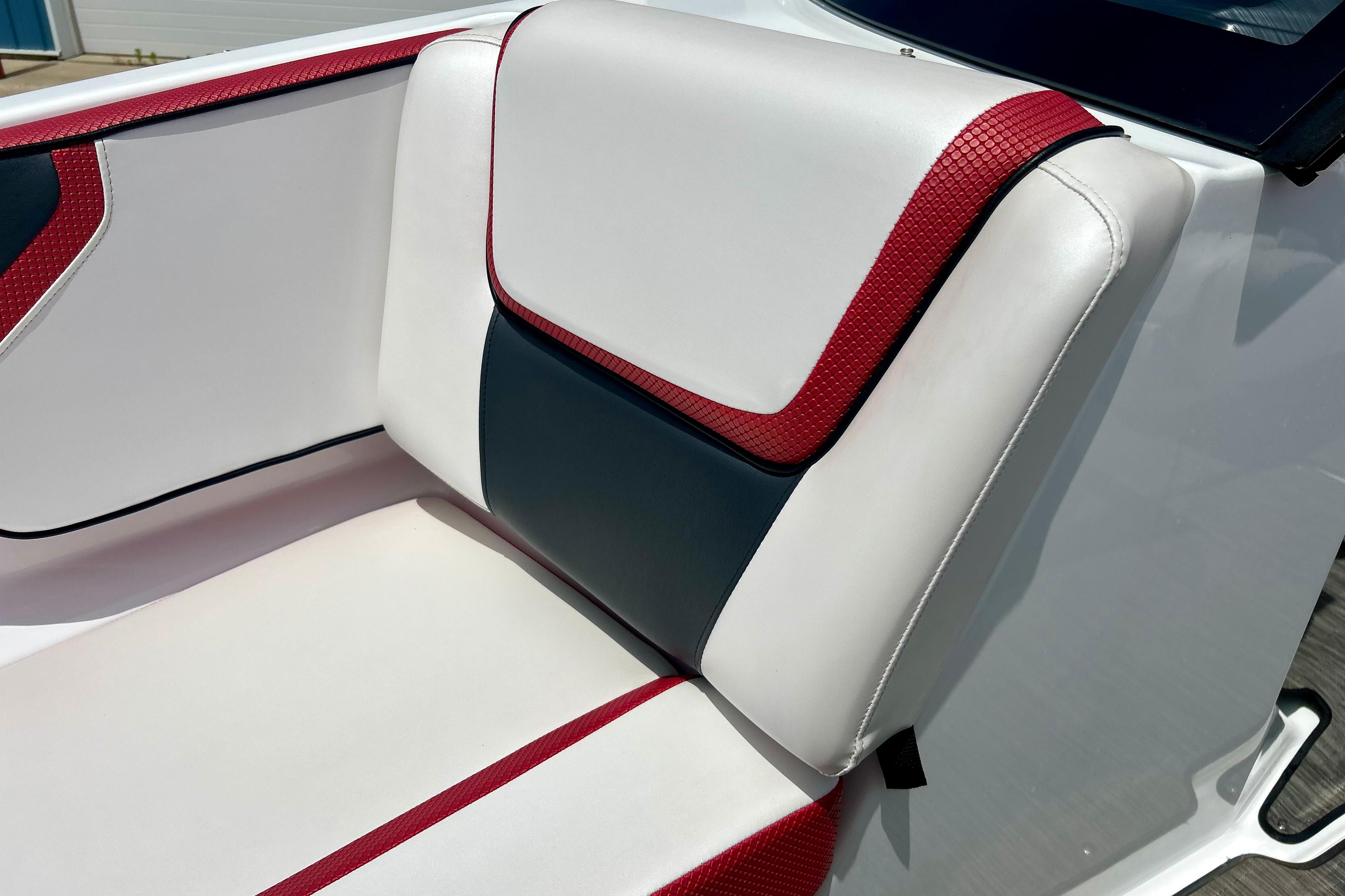 2021 Scarab 195 ID boat seat with red, white, and black upholstery design.