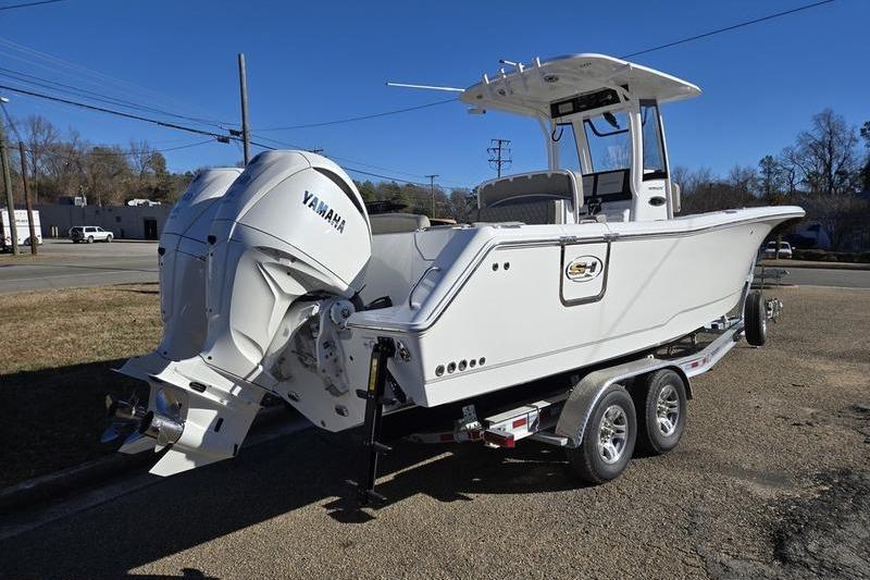 2026 Sea Hunt Ultra 275 Coffin Box boat on trailer, featuring Yamaha engine.