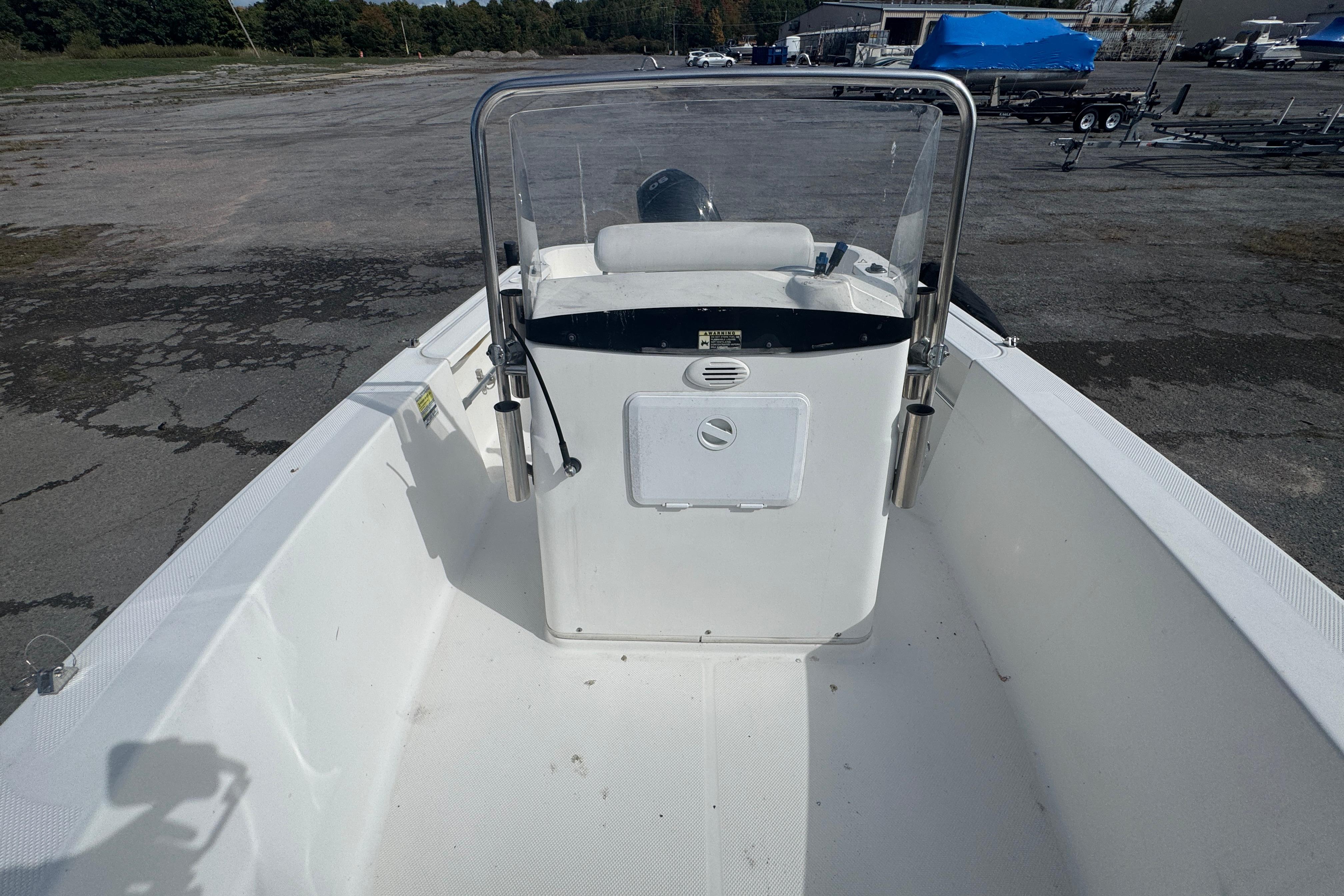 2007 Trophy 1703 Center Console boat on dry land, showcasing helm and seating area.