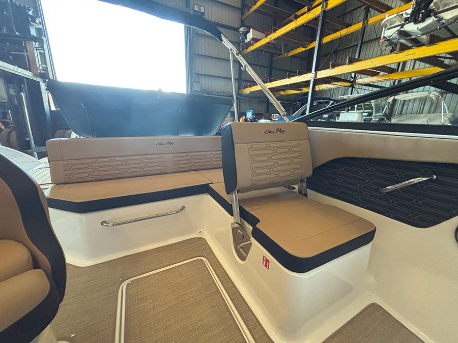 2025 Sea Ray SPX 190 Outboard interior with tan seating and modern design.