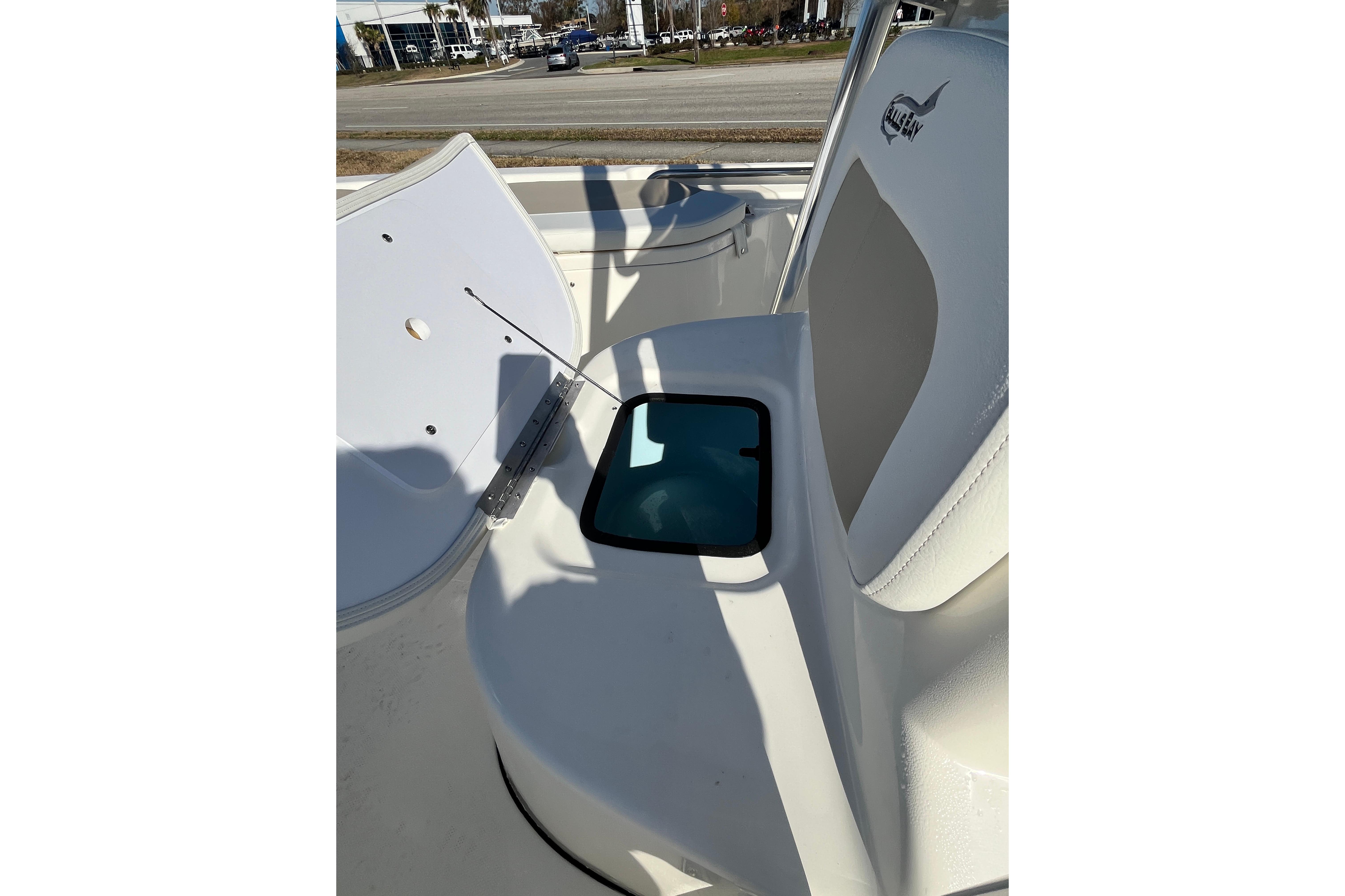 2026 Bulls Bay 2200 boat interior with seating and storage compartment.