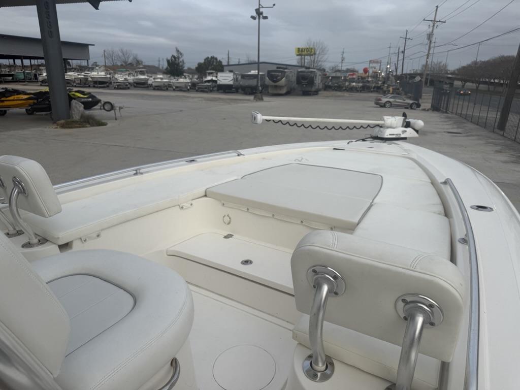 2017 ShearWater 270 Carolina Flare boat interior with white seating and trolling motor.