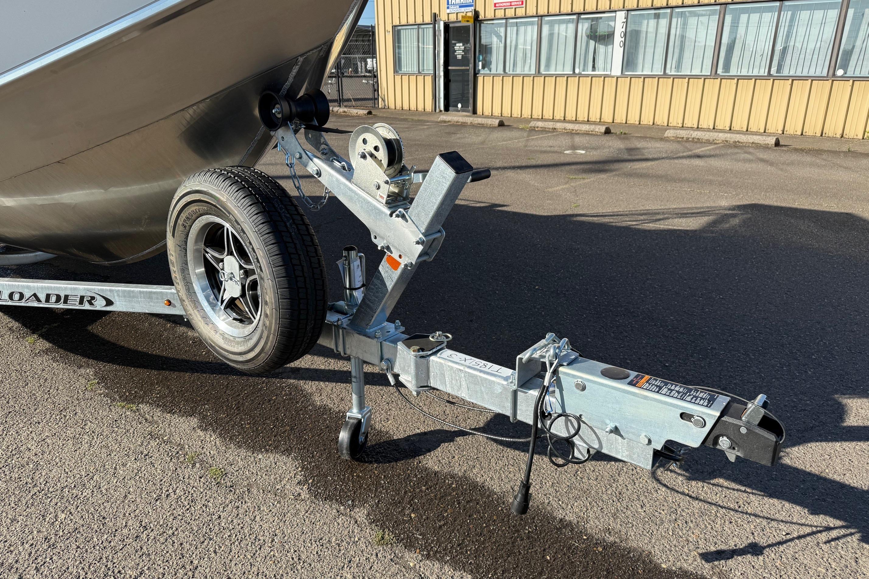 Trailer for 2026 Thunder Jet 185 Luxor boat parked on asphalt.