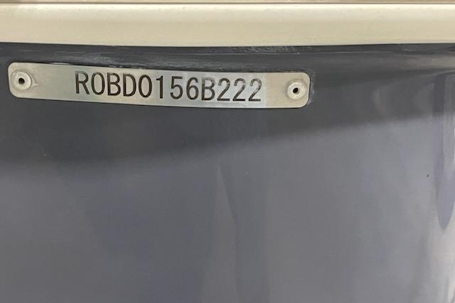 2022 Robalo R247 Dual Console boat with visible hull identification number.