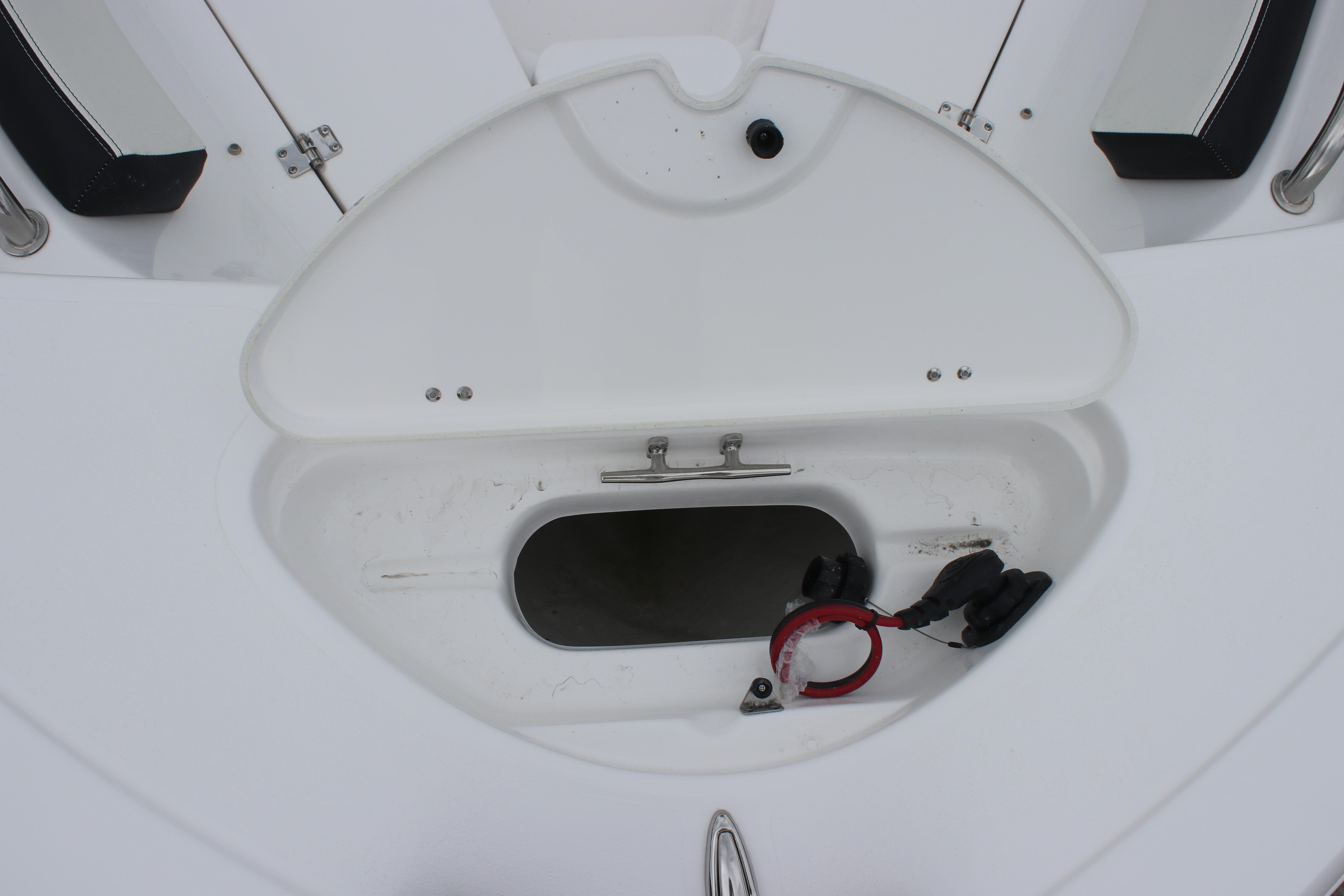 Open storage compartment on 2026 Tidewater 198 CC Adventure boat.