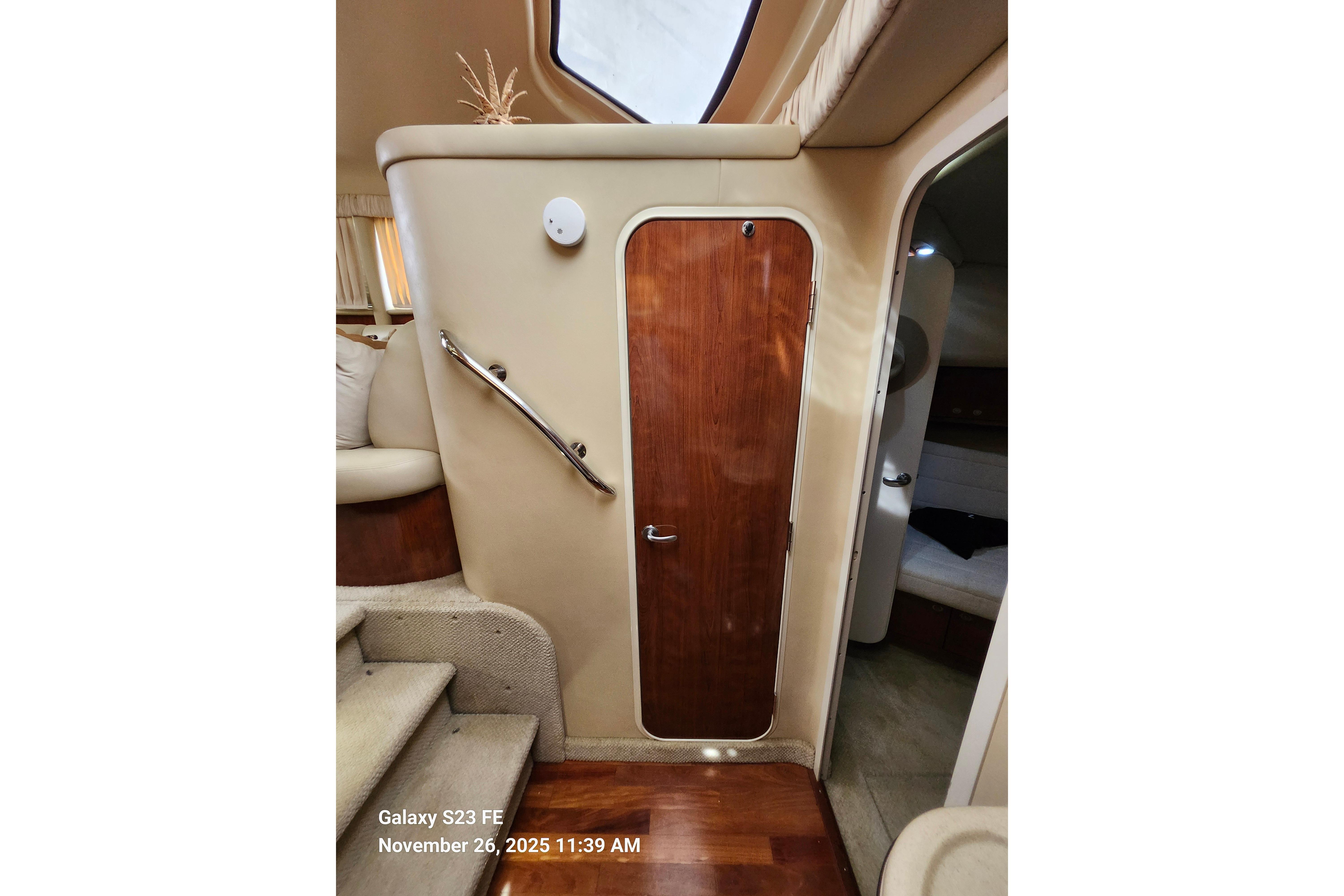 Entry door to guest/day head from galley.