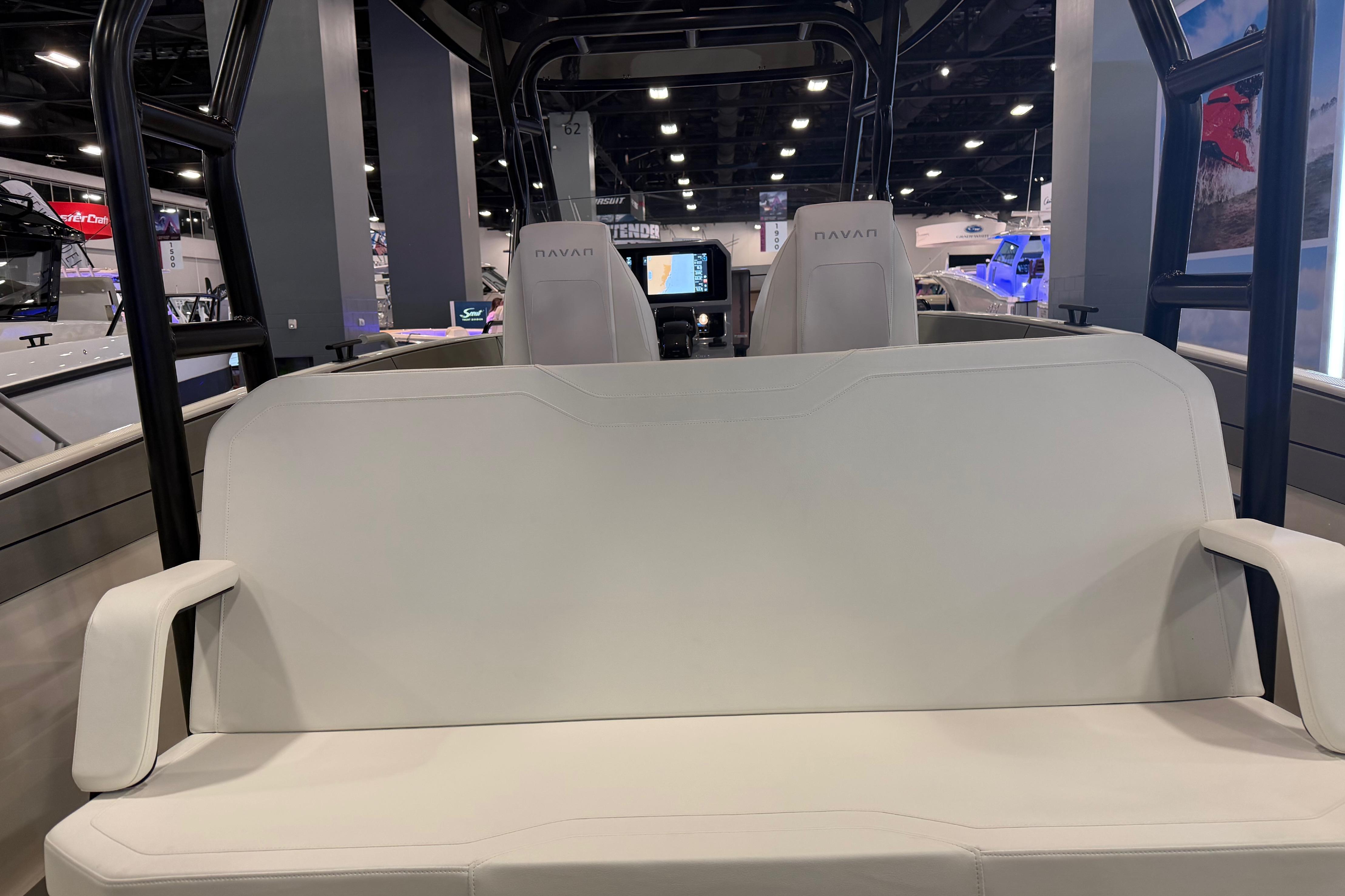 Interior of 2027 Navan T30 boat with white seating and modern design.