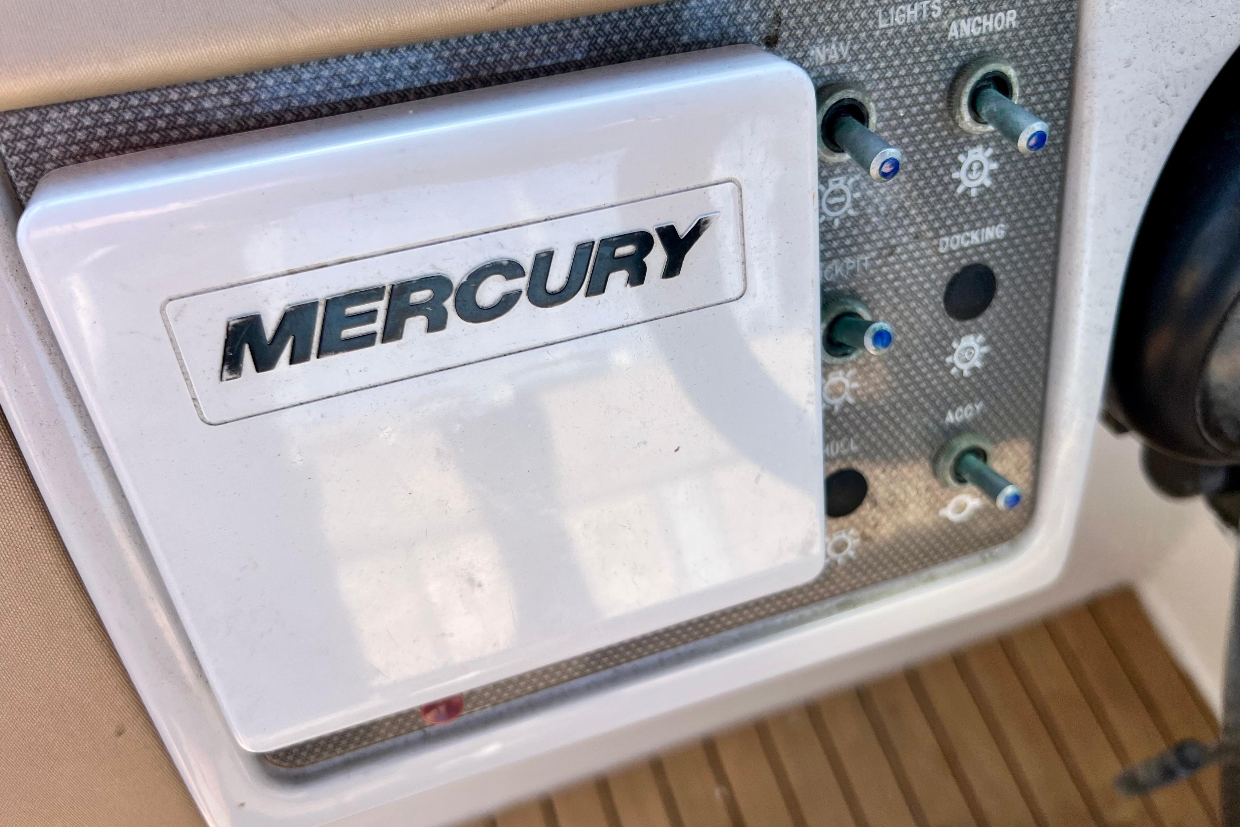 Control panel of a 2016 Sea Ray 290 Sundeck Outboard with Mercury branding.