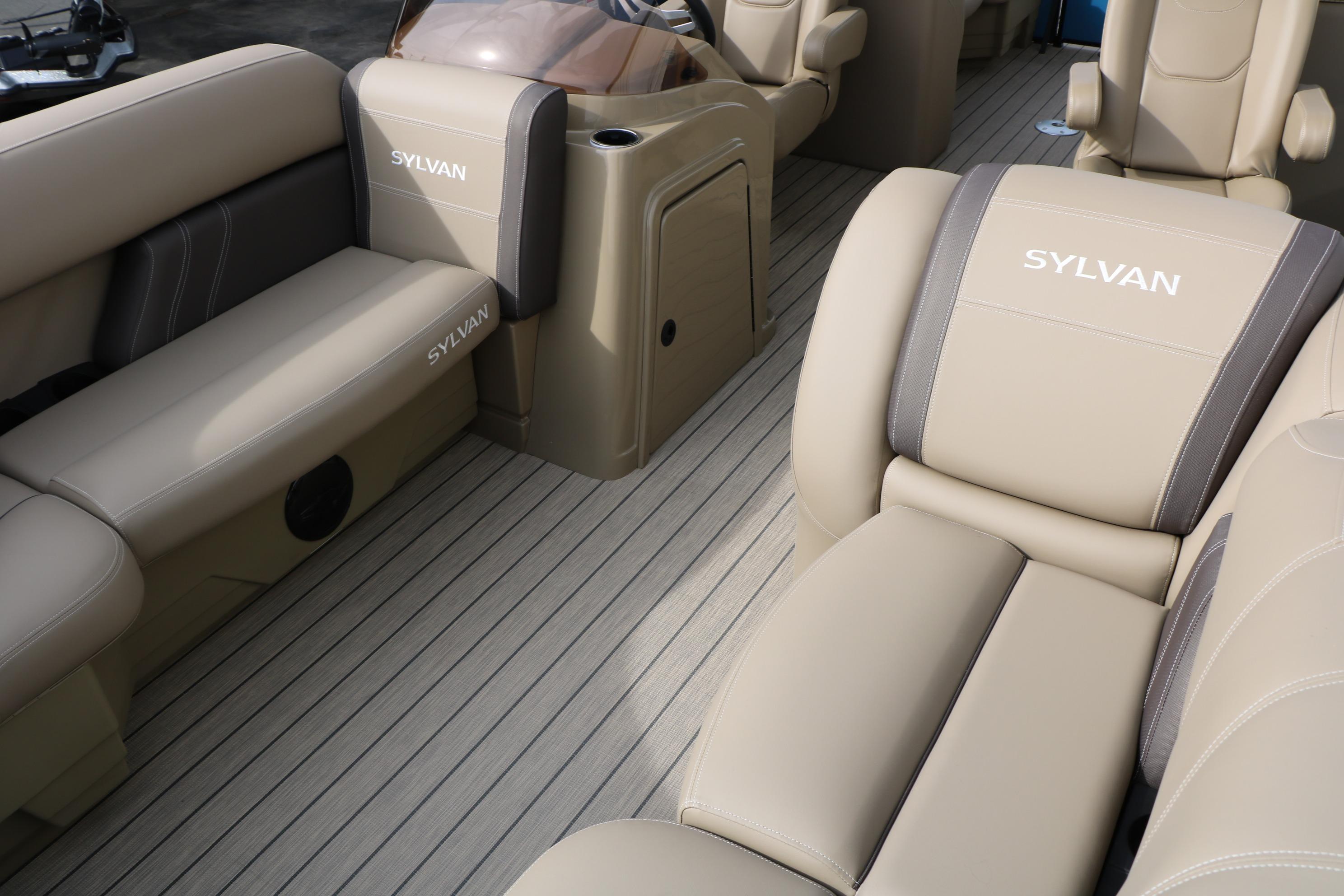 2026 Sylvan Mirage 822 LZ boat interior with beige seating and sleek design.