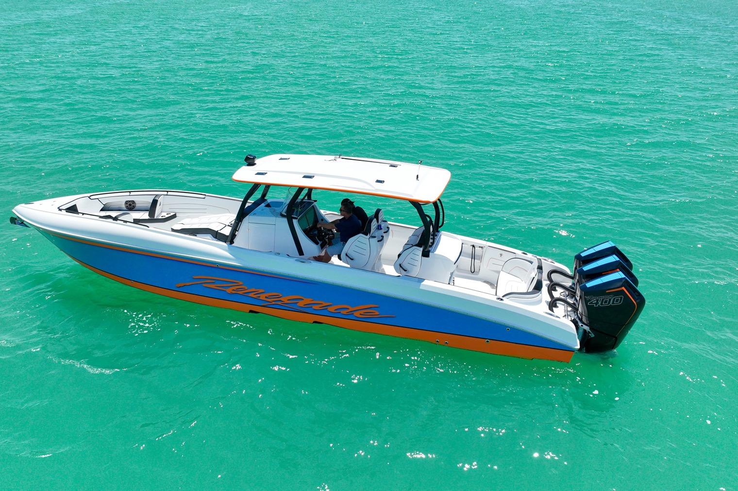 2027 Renegade 38' Open boat on turquoise water, featuring sleek design and powerful engines.