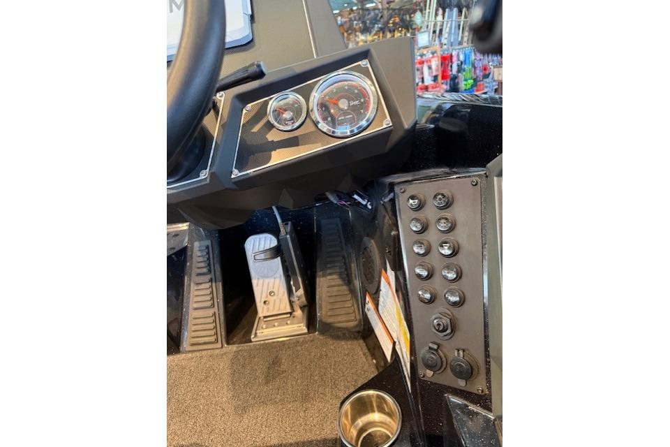 Dashboard of 2025 Ranger Z518 Cup-Equipped boat with gauges and controls.