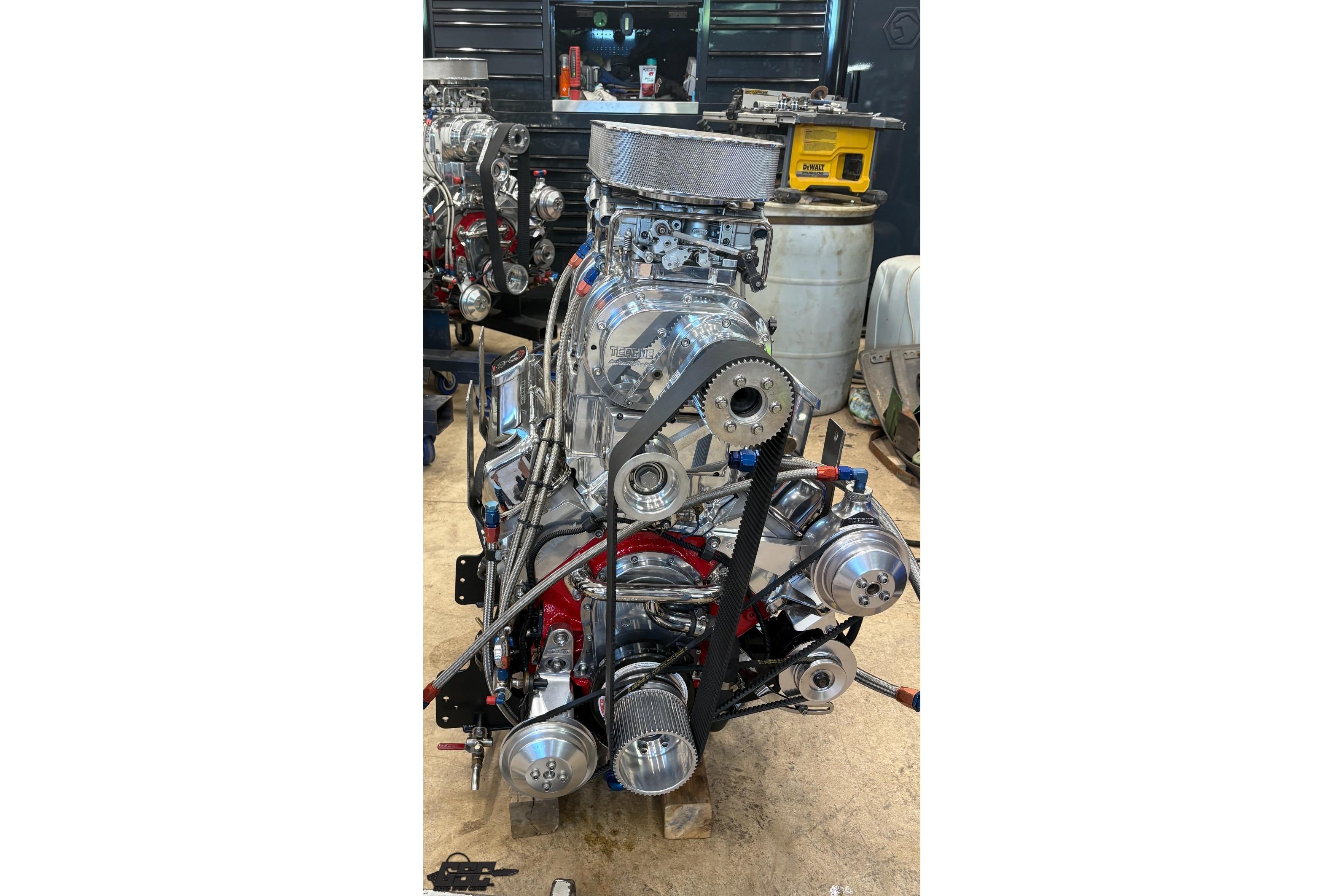 High-performance engine of a 2002 Formula 382 FASTech, showcasing intricate mechanical components.