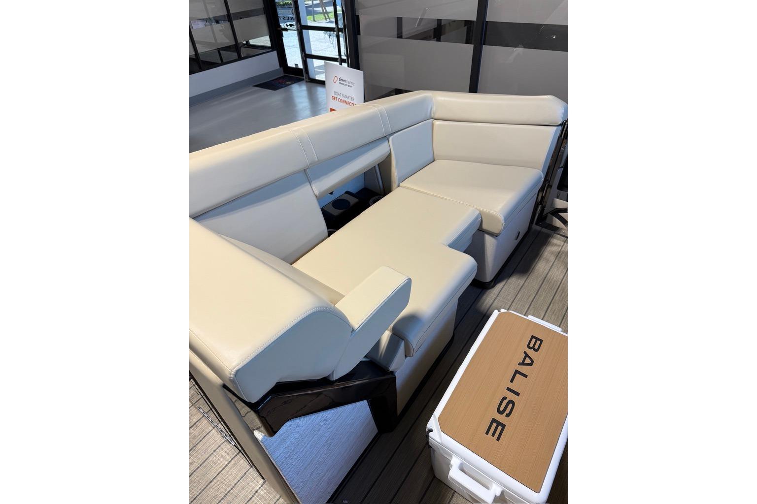 Luxurious seating on the 2026 Balise Halo 26C Twin boat, featuring cream upholstery.